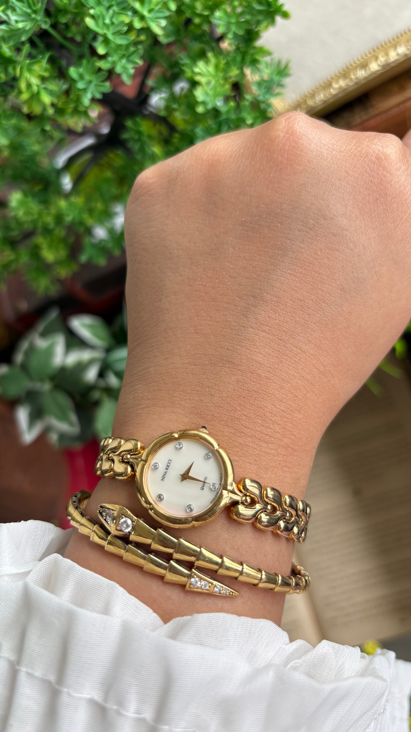 Vintage Nina Ricci Watch in Gold Tone Mother of Pearl Dial Flower Art Deco