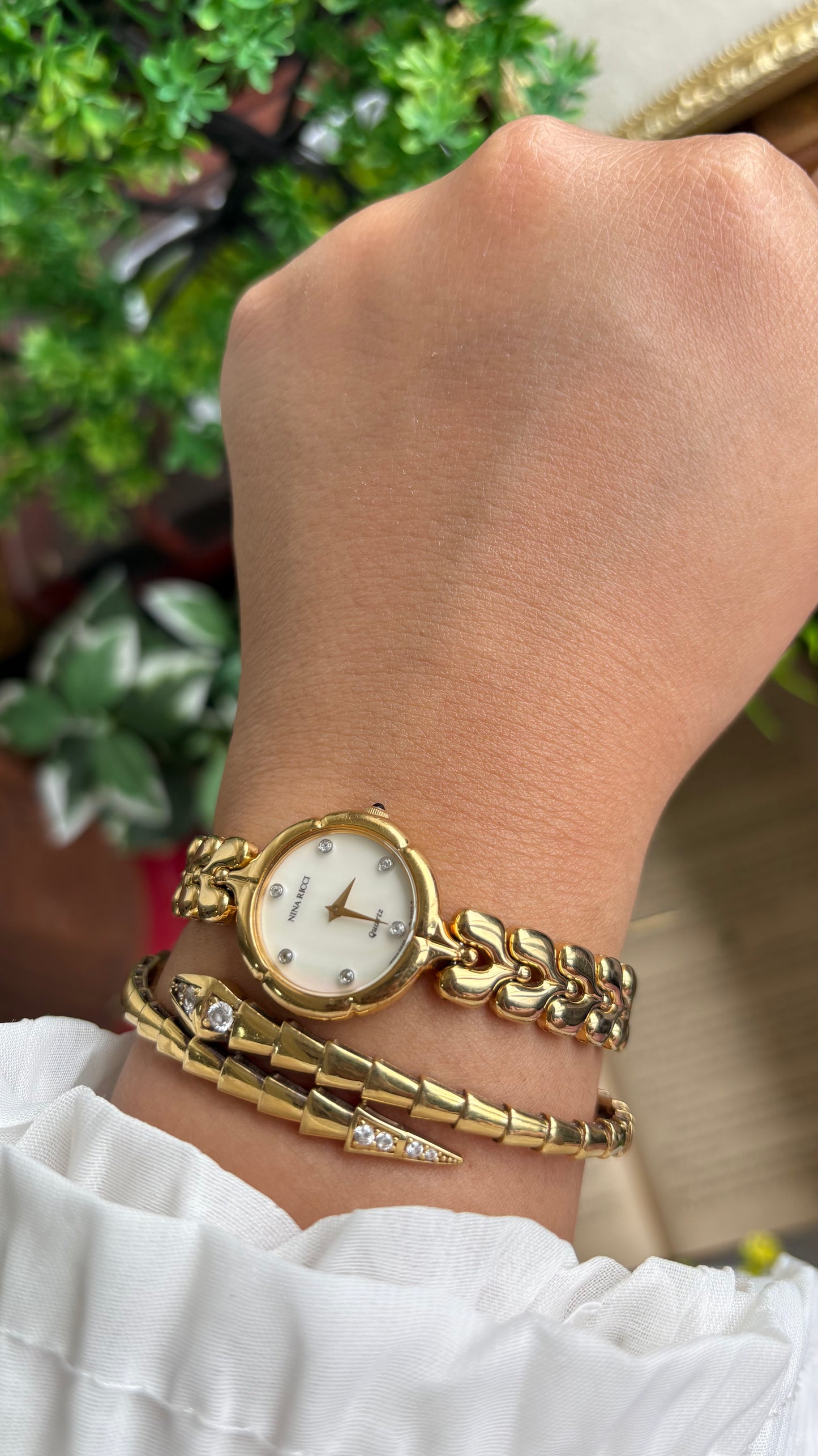 Vintage Nina Ricci Watch in Gold Tone Mother of Pearl Dial Flower Art Deco