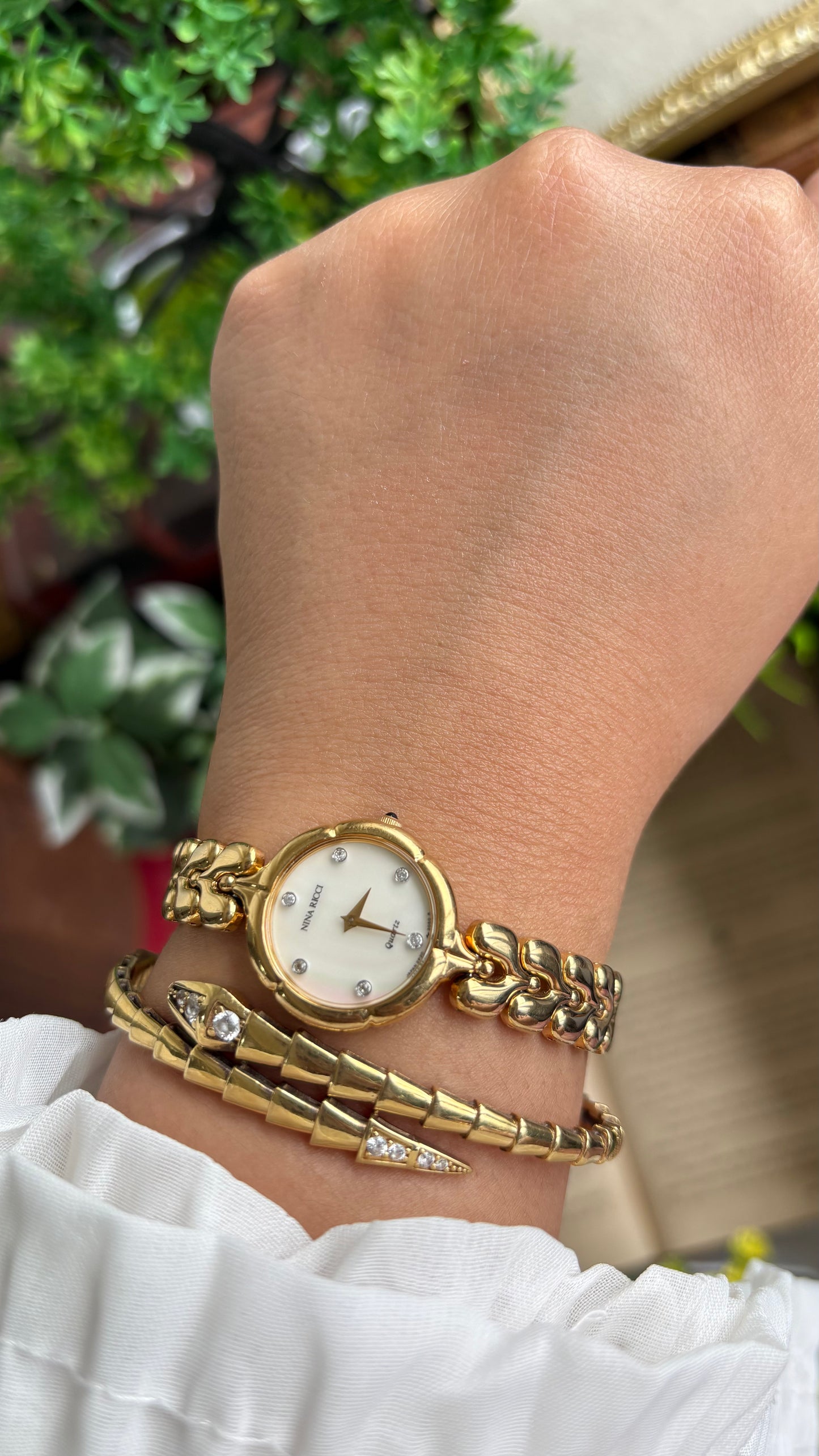 Vintage Nina Ricci Watch in Gold Tone Mother of Pearl Dial Flower Art Deco