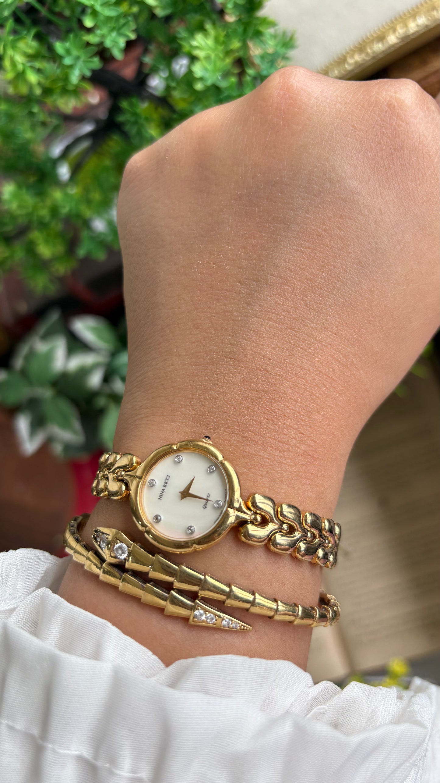 Vintage Nina Ricci Watch in Gold Tone Mother of Pearl Dial Flower Art Deco