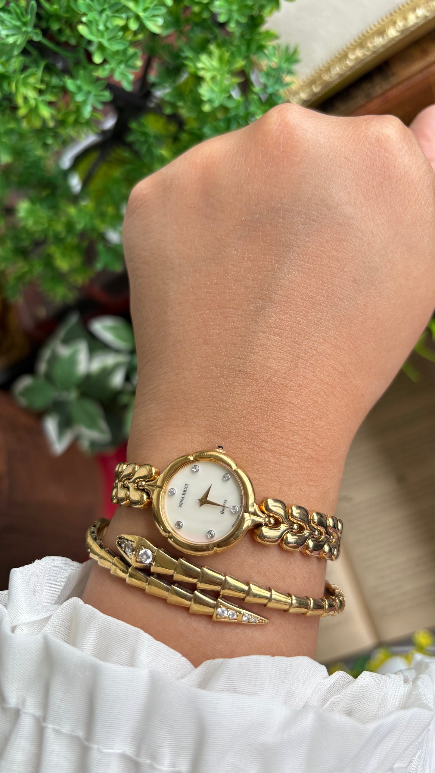 Vintage Nina Ricci Watch in Gold Tone Mother of Pearl Dial Flower Art Deco