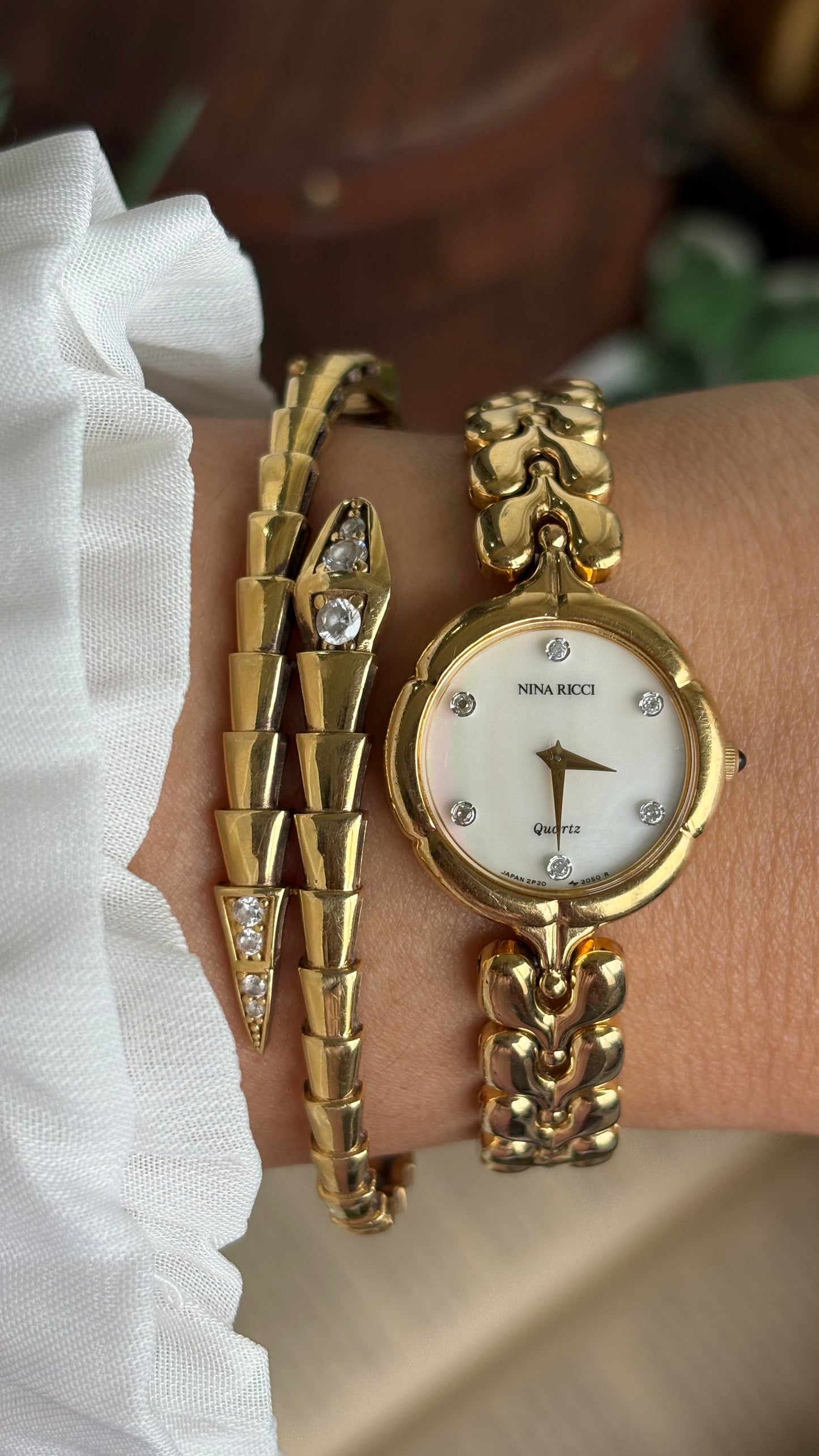Vintage Nina Ricci Watch in Gold Tone Mother of Pearl Dial Flower Art Deco