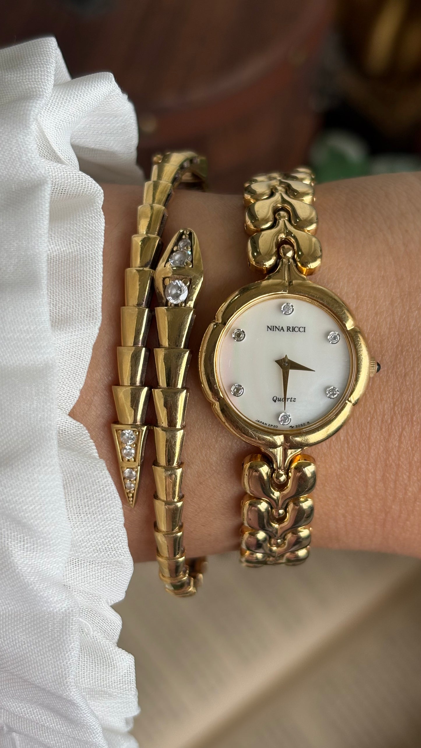 Vintage Nina Ricci Watch in Gold Tone Mother of Pearl Dial Flower Art Deco
