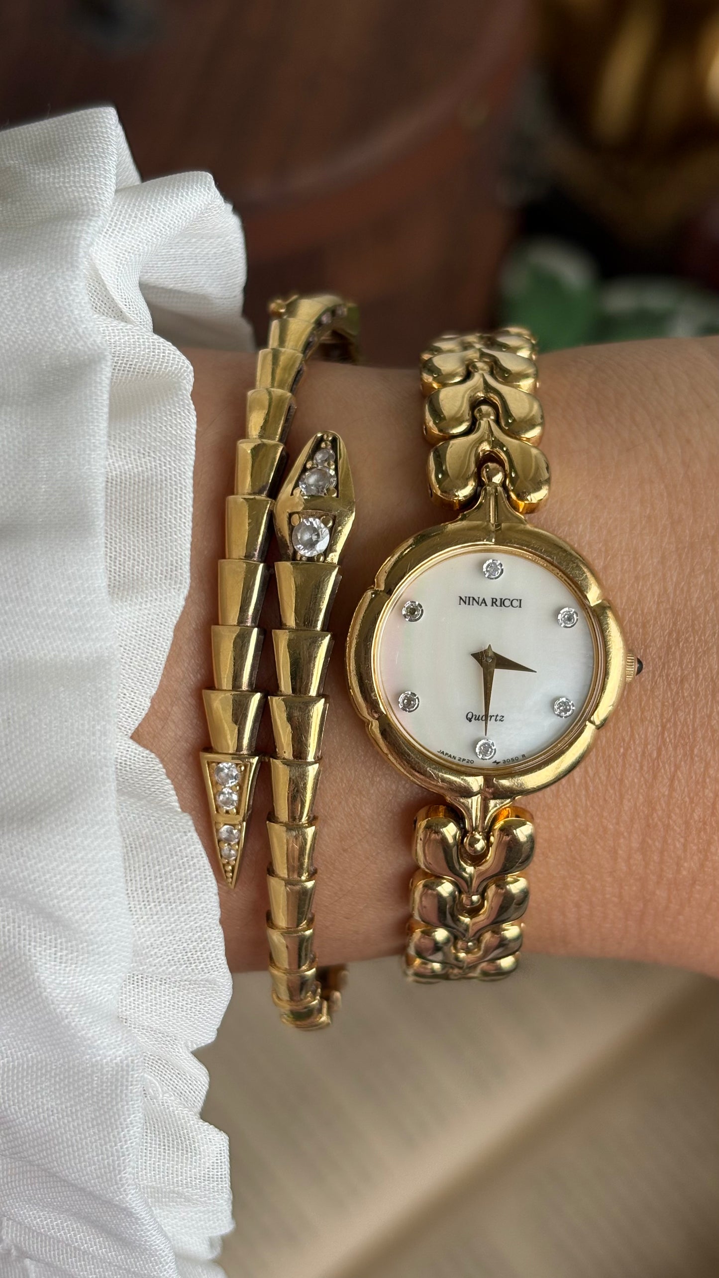 Vintage Nina Ricci Watch in Gold Tone Mother of Pearl Dial Flower Art Deco