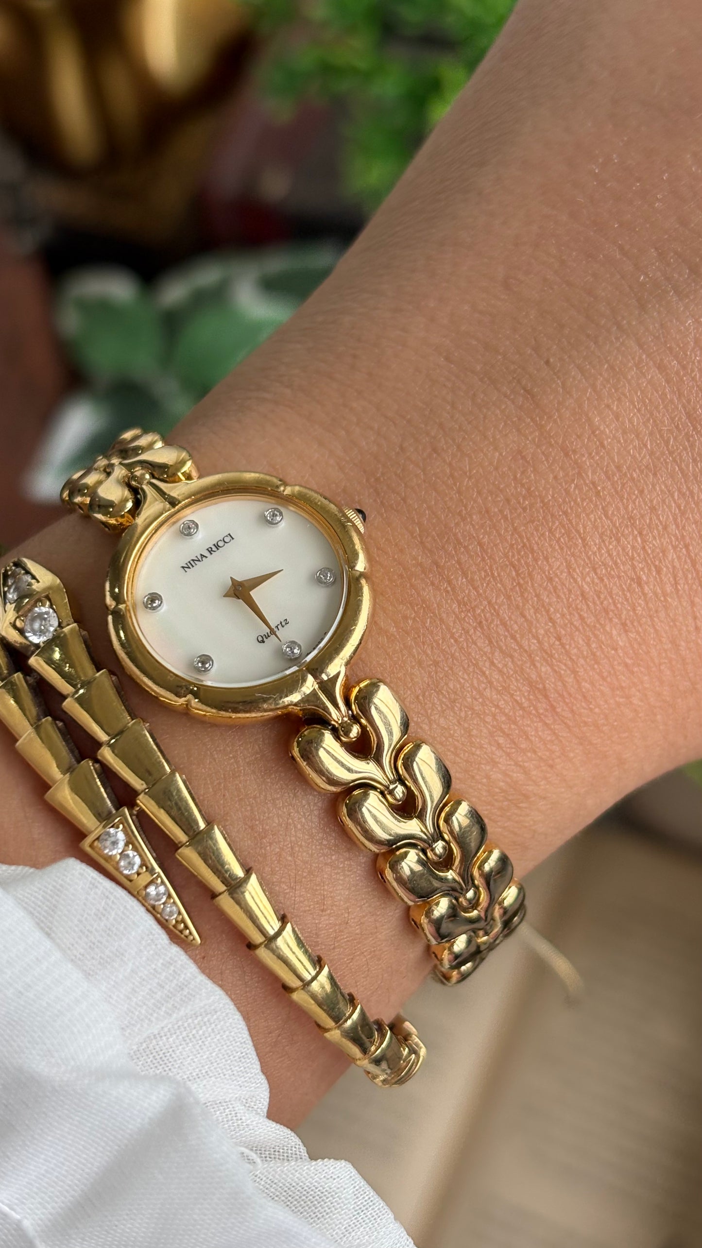 Vintage Nina Ricci Watch in Gold Tone Mother of Pearl Dial Flower Art Deco
