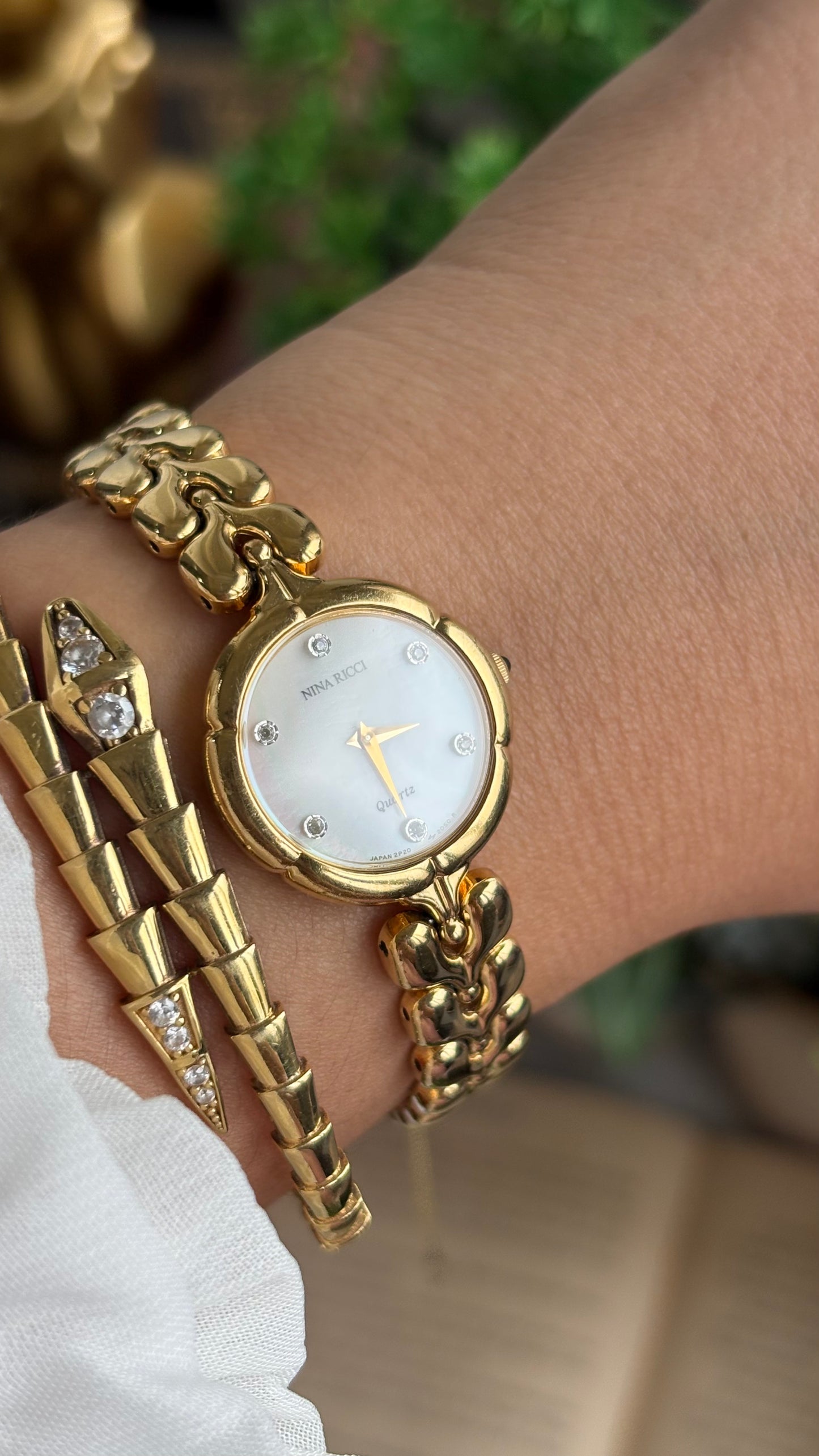 Vintage Nina Ricci Watch in Gold Tone Mother of Pearl Dial Flower Art Deco