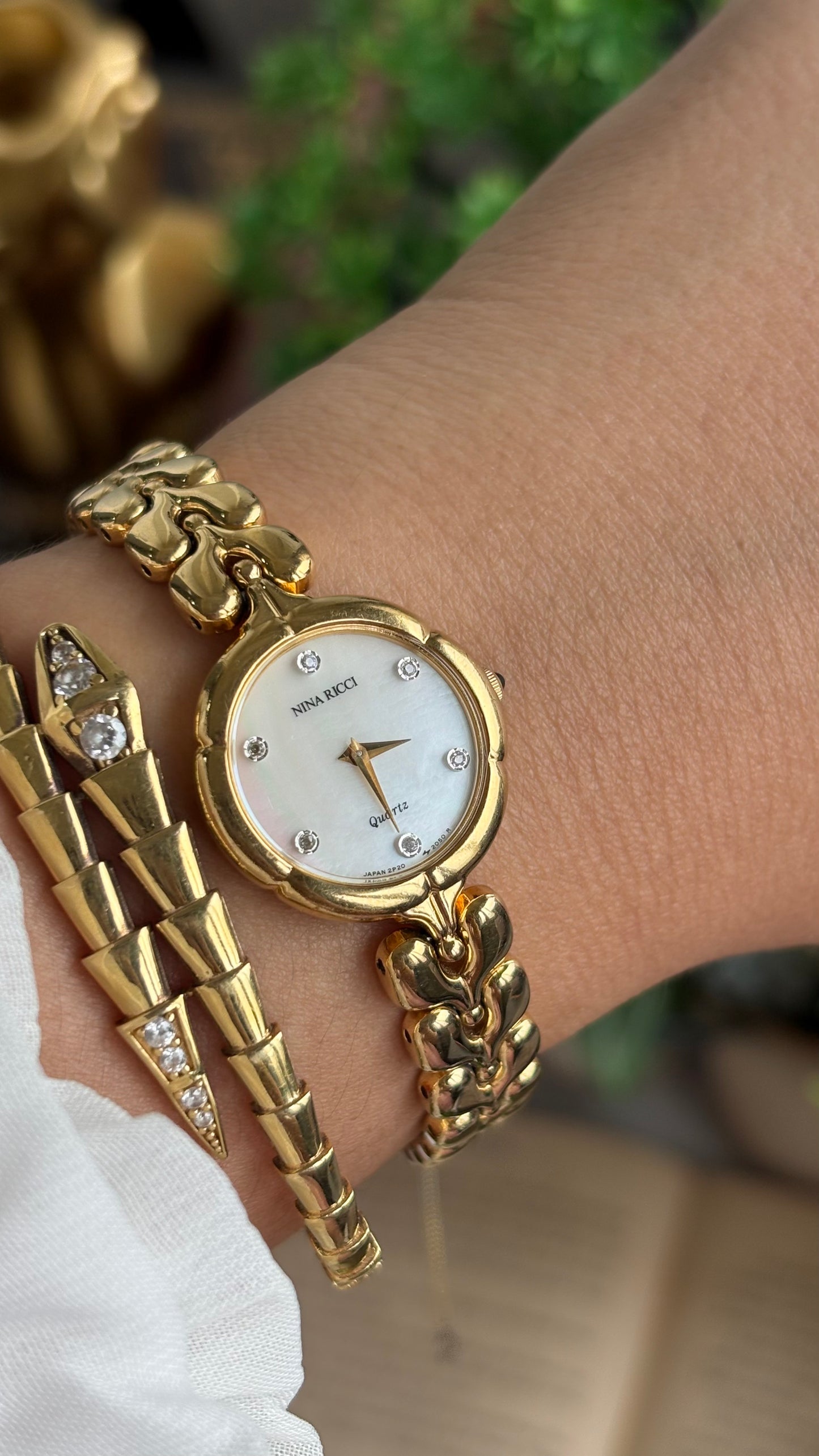 Vintage Nina Ricci Watch in Gold Tone Mother of Pearl Dial Flower Art Deco