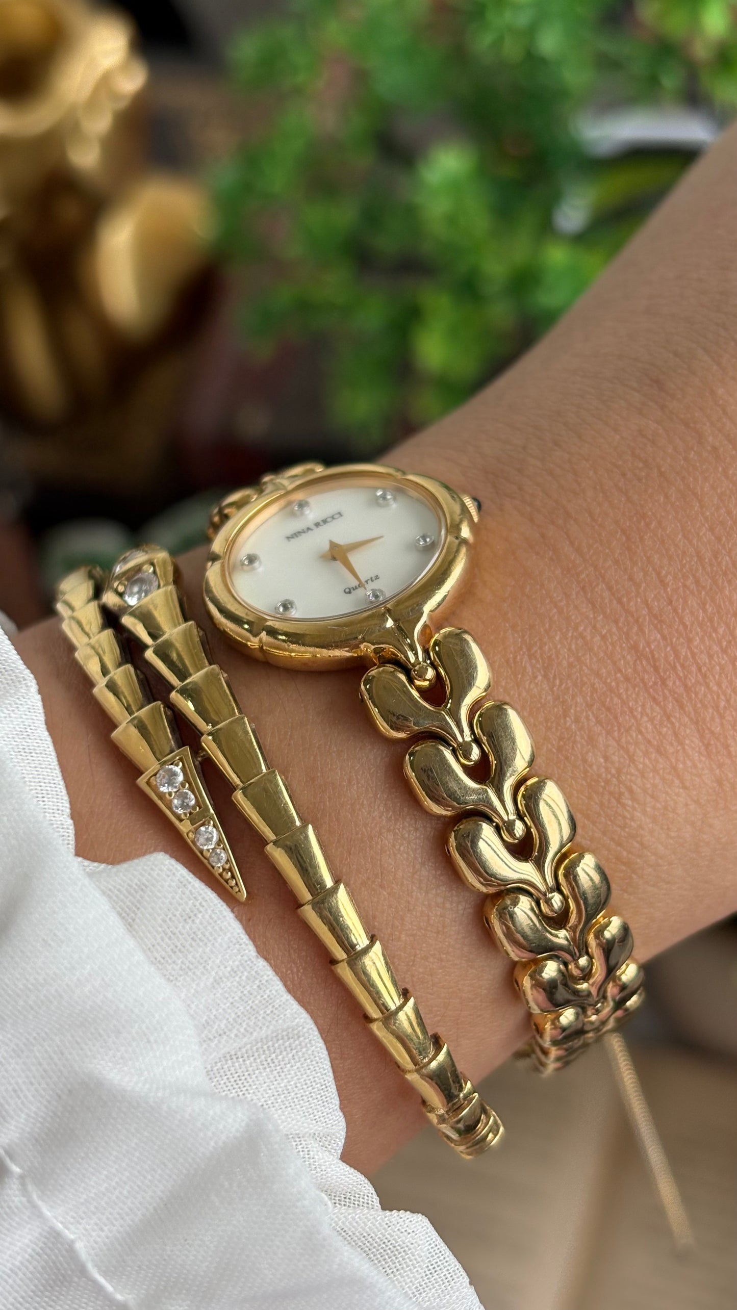 Vintage Nina Ricci Watch in Gold Tone Mother of Pearl Dial Flower Art Deco