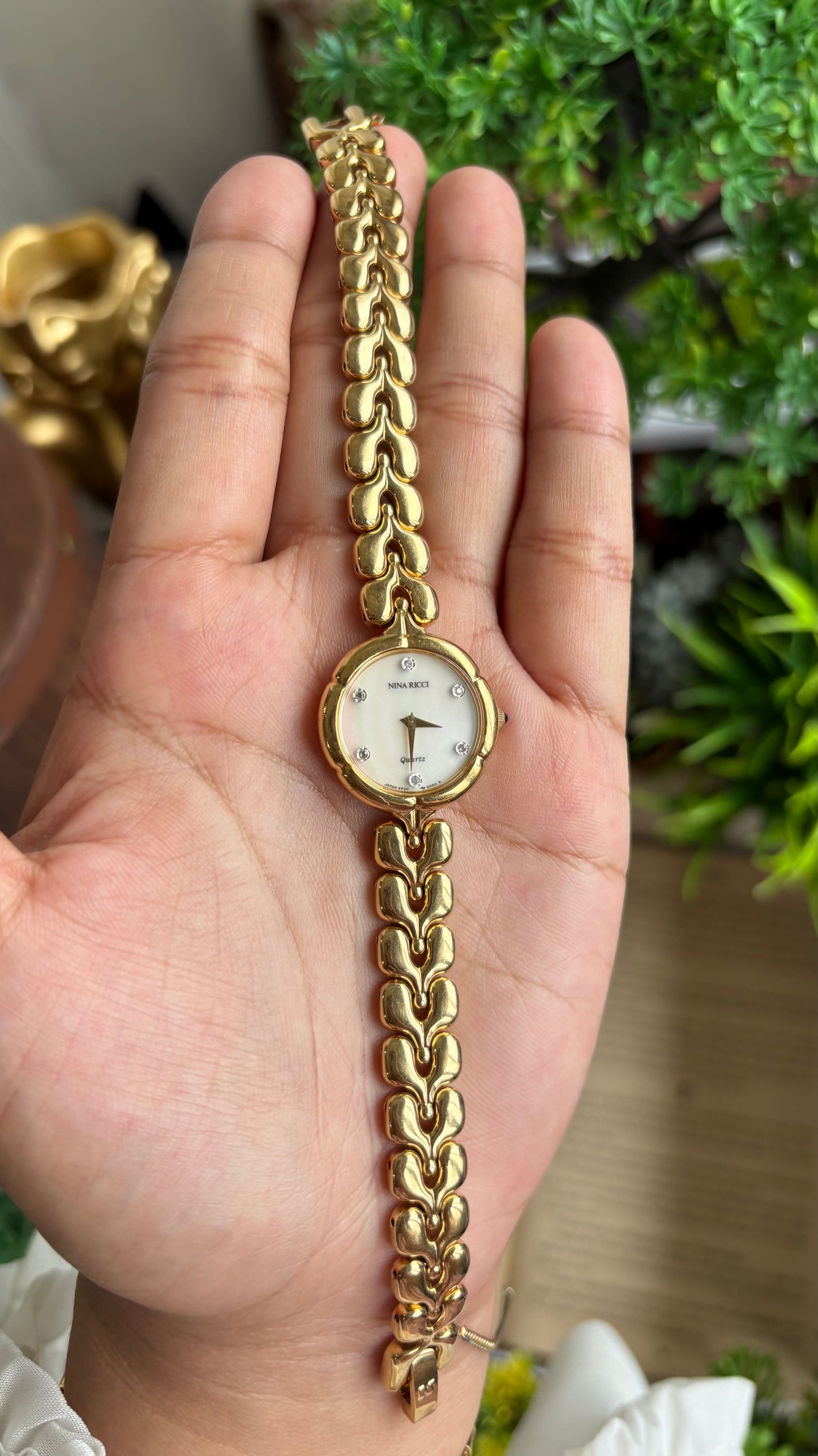 Vintage Nina Ricci Watch in Gold Tone Mother of Pearl Dial Flower Art Deco