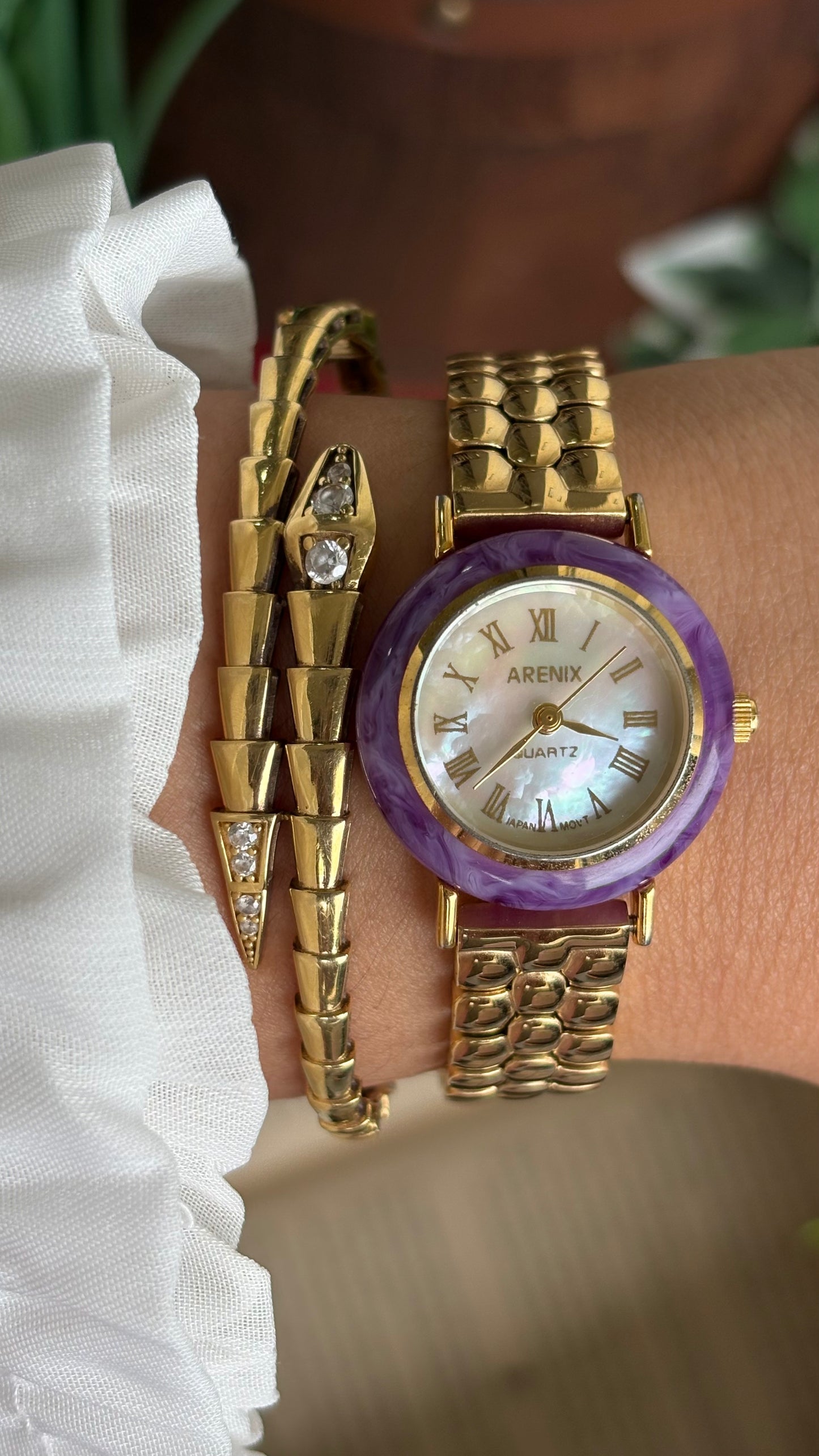 Vintage Arenix Watch in Gold Tone Amethyst Bezel Pearl Dial