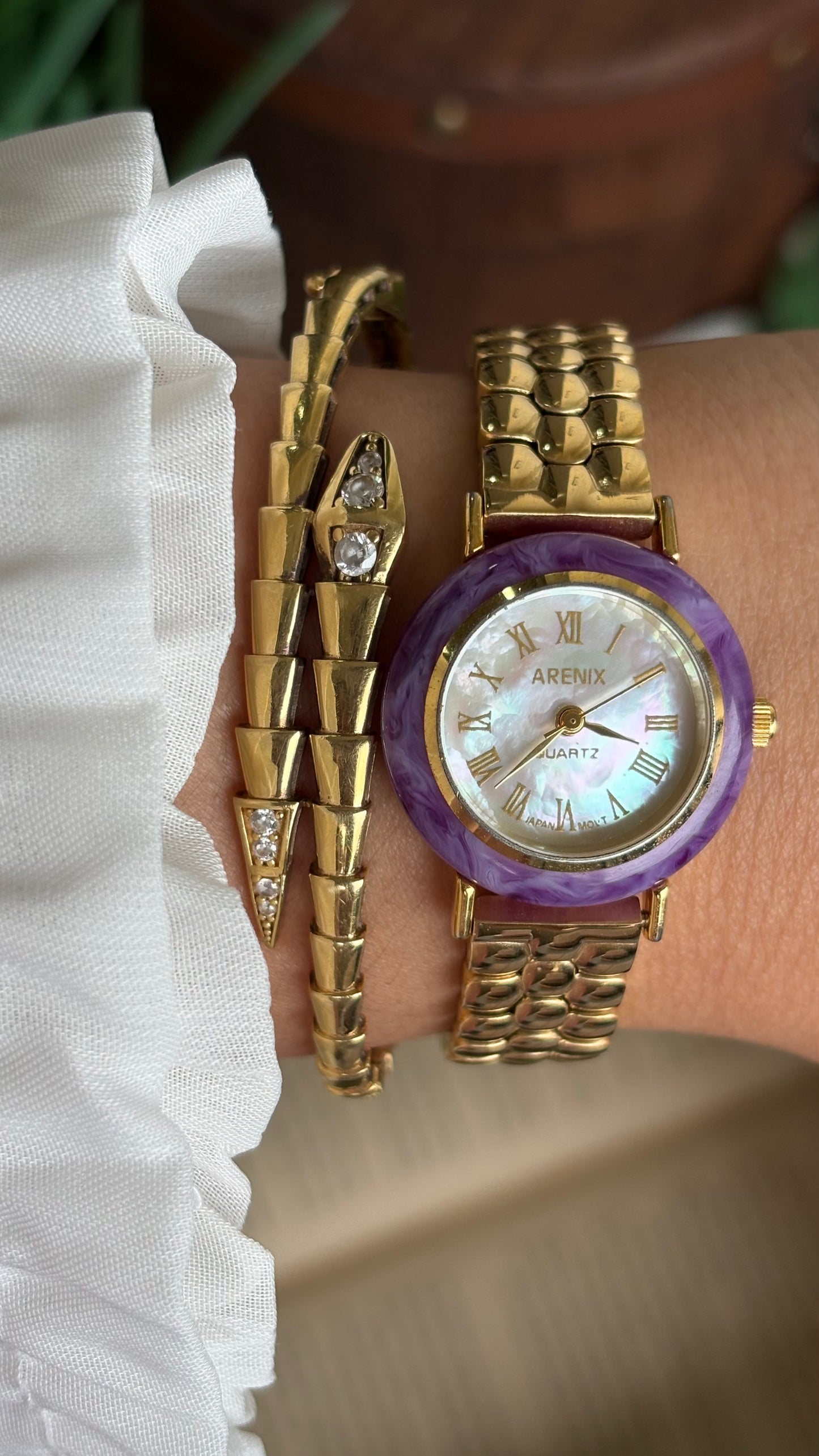 Vintage Arenix Watch in Gold Tone Amethyst Bezel Pearl Dial