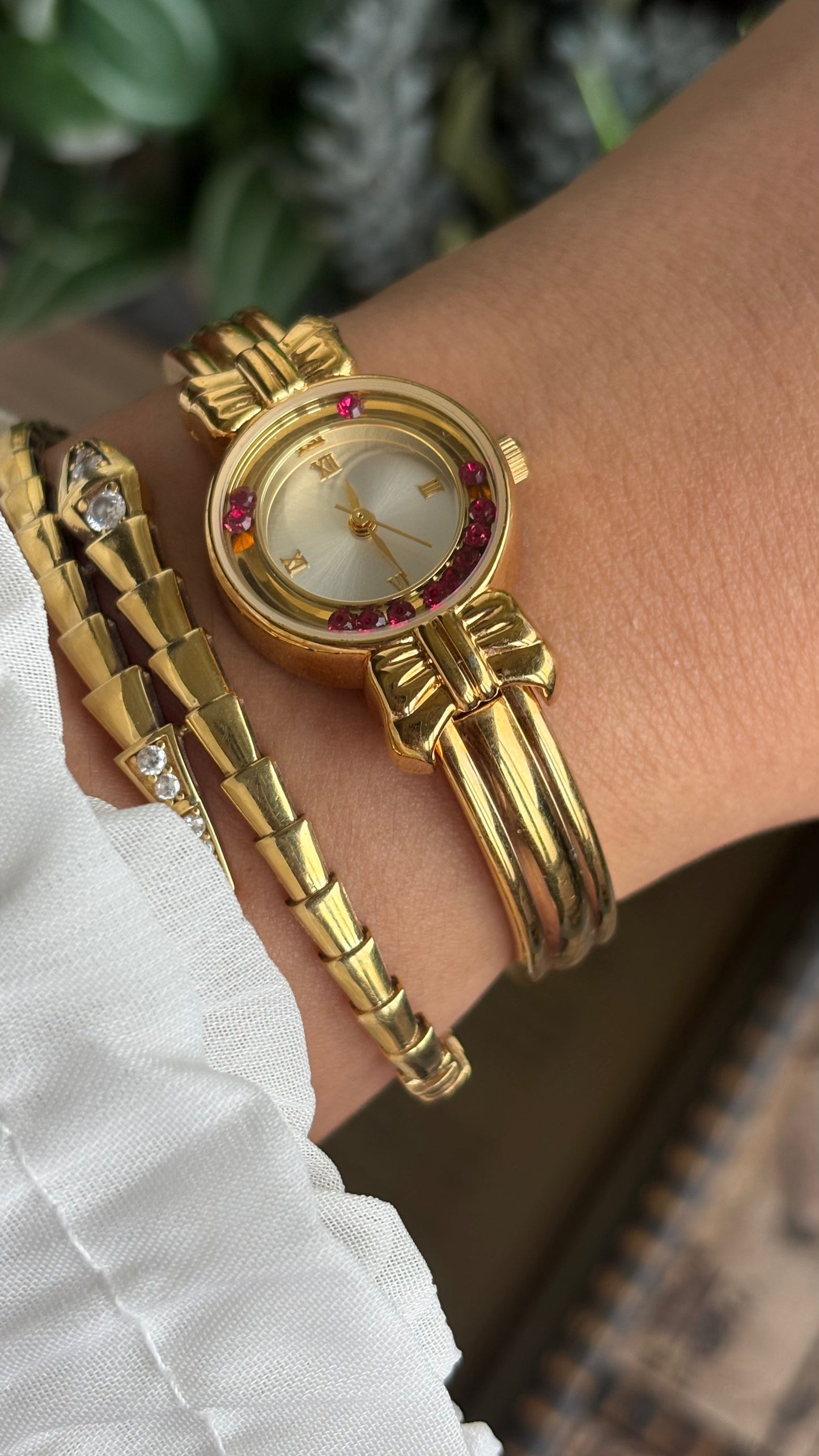 Vintage Coquette Watch in Gold Tone with Dancing Rubies