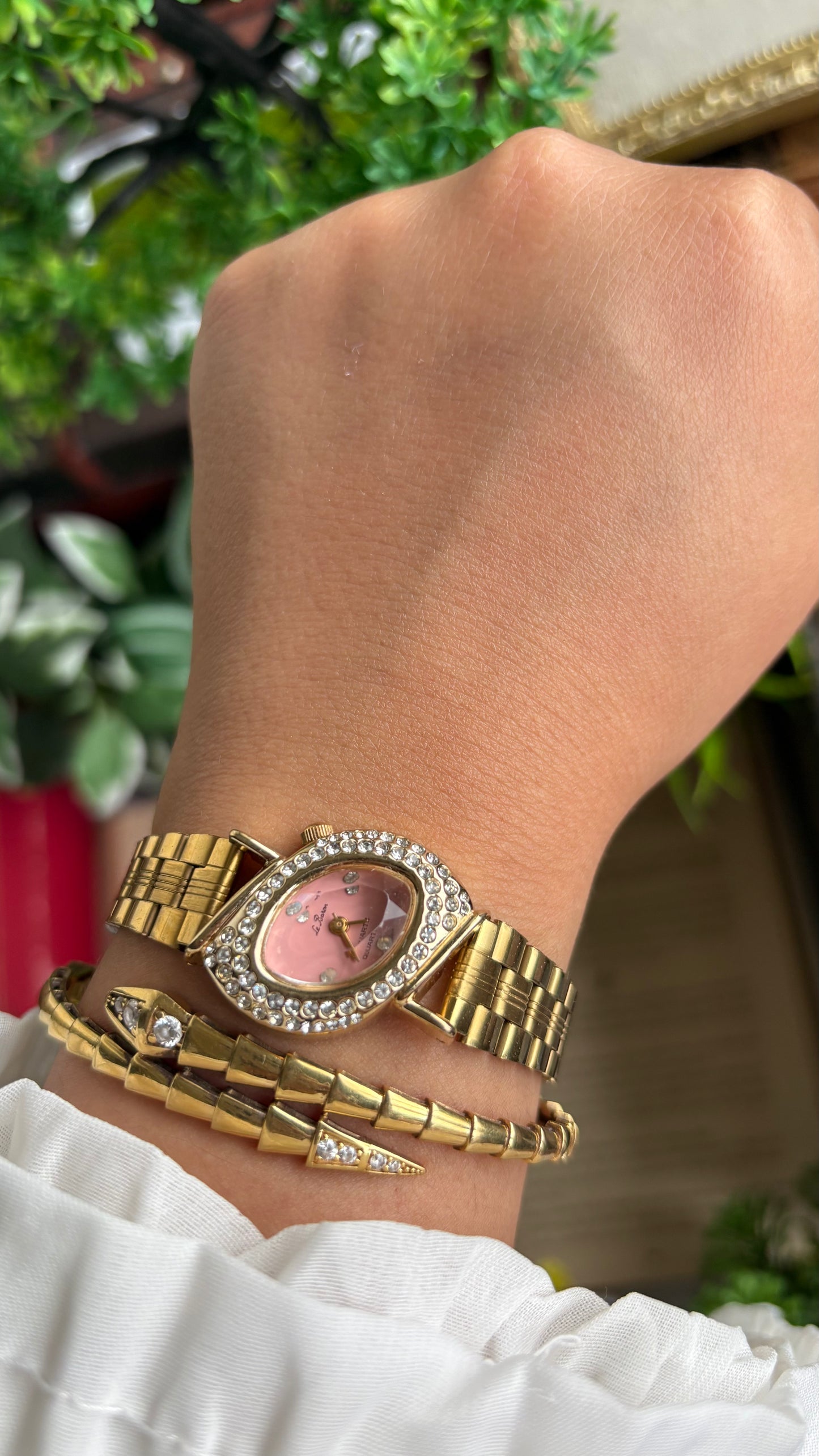 Vintage Le Baron Bejeweled Watch in Gold Tone Pink Dial Leaf Face Shape