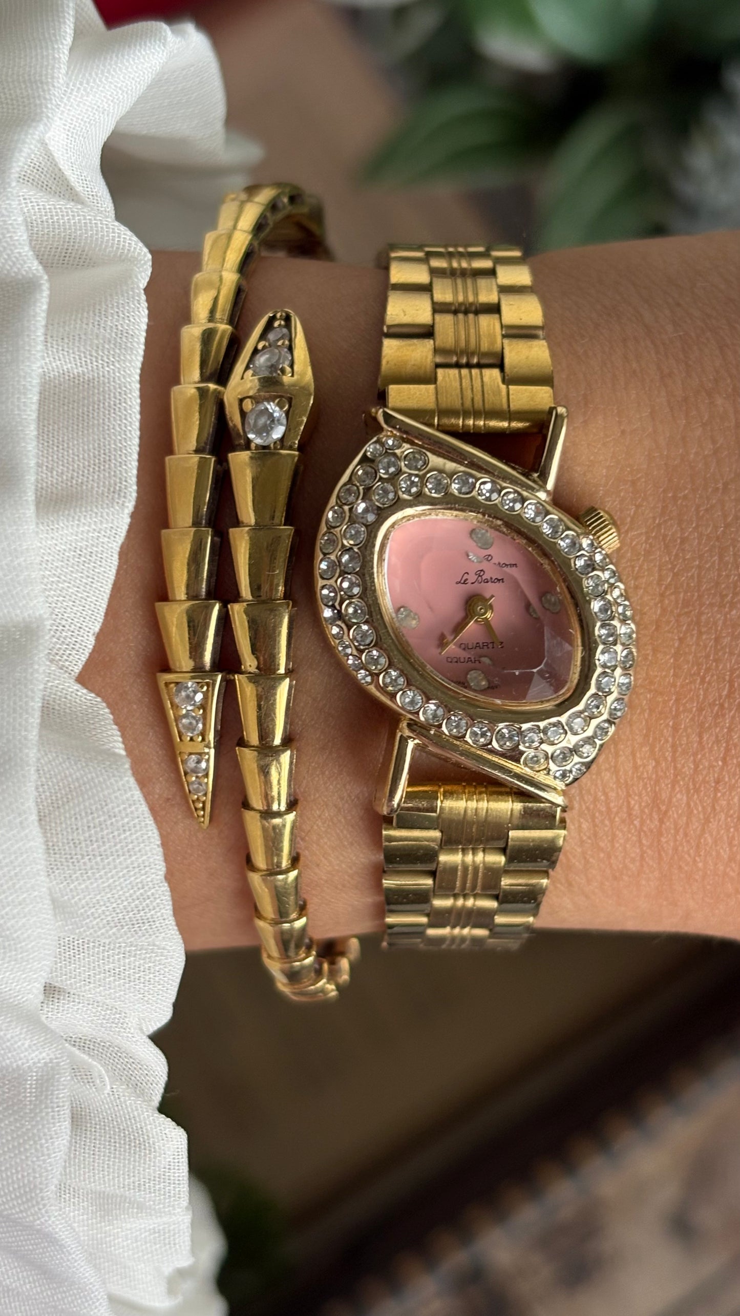 Vintage Le Baron Bejeweled Watch in Gold Tone Pink Dial Leaf Face Shape