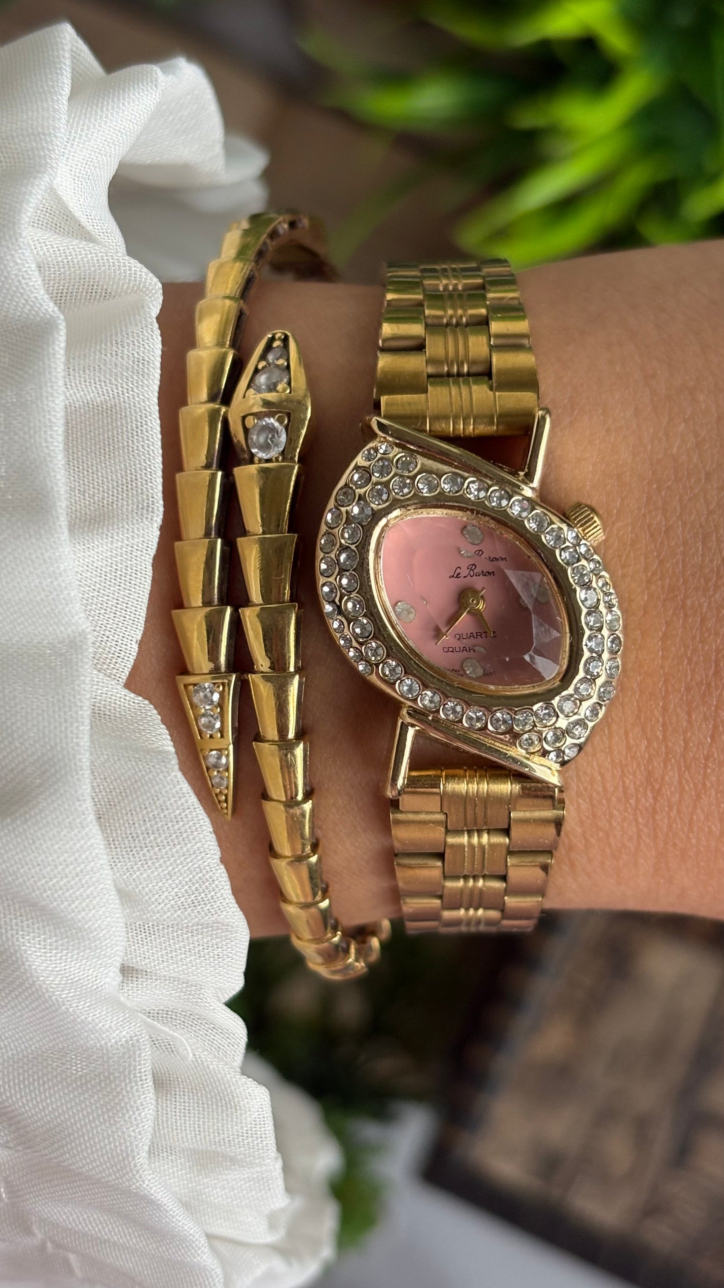 Vintage Le Baron Bejeweled Watch in Gold Tone Pink Dial Leaf Face Shape