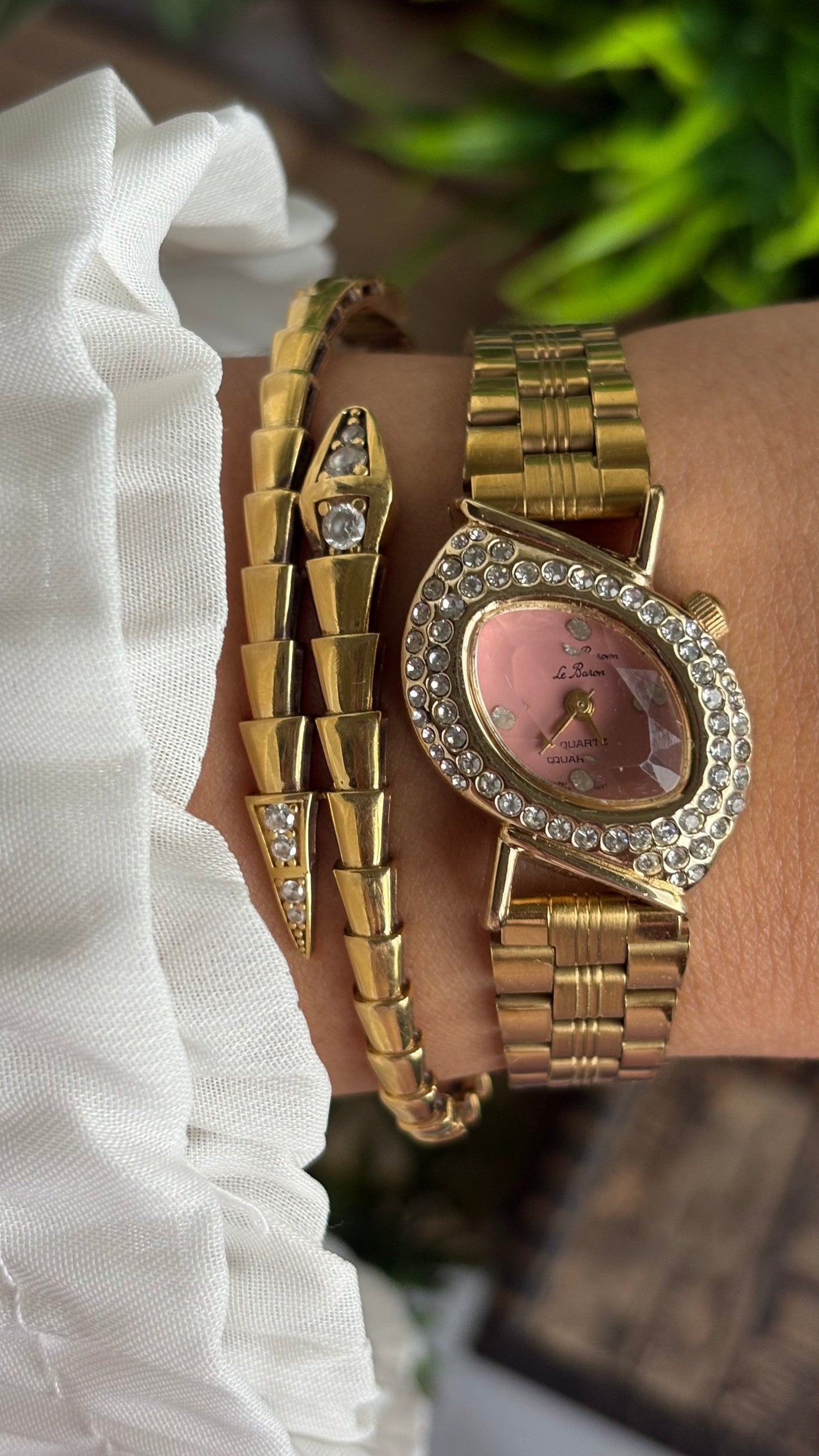 Vintage Le Baron Bejeweled Watch in Gold Tone Pink Dial Leaf Face Shape