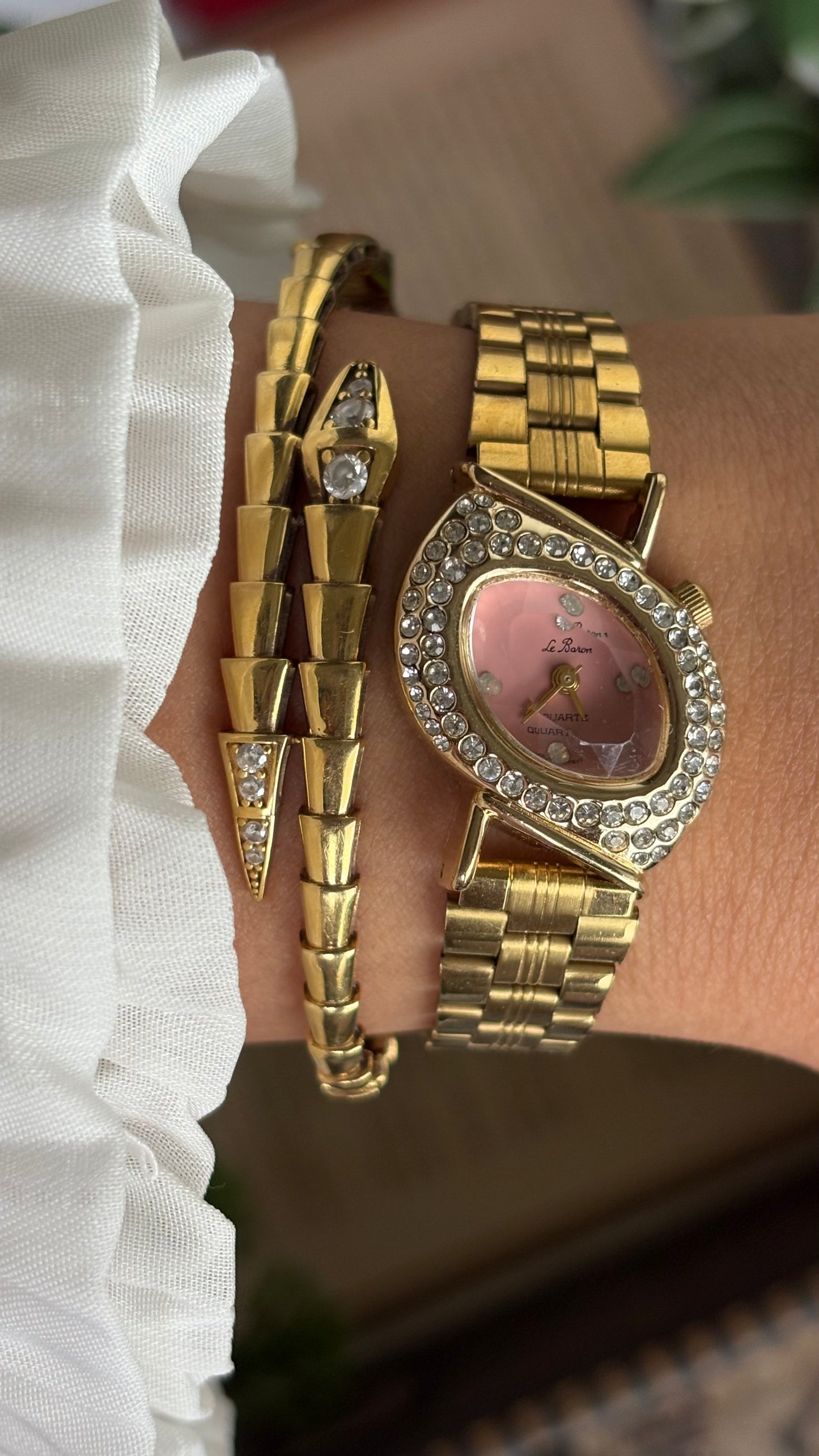 Vintage Le Baron Bejeweled Watch in Gold Tone Pink Dial Leaf Face Shape