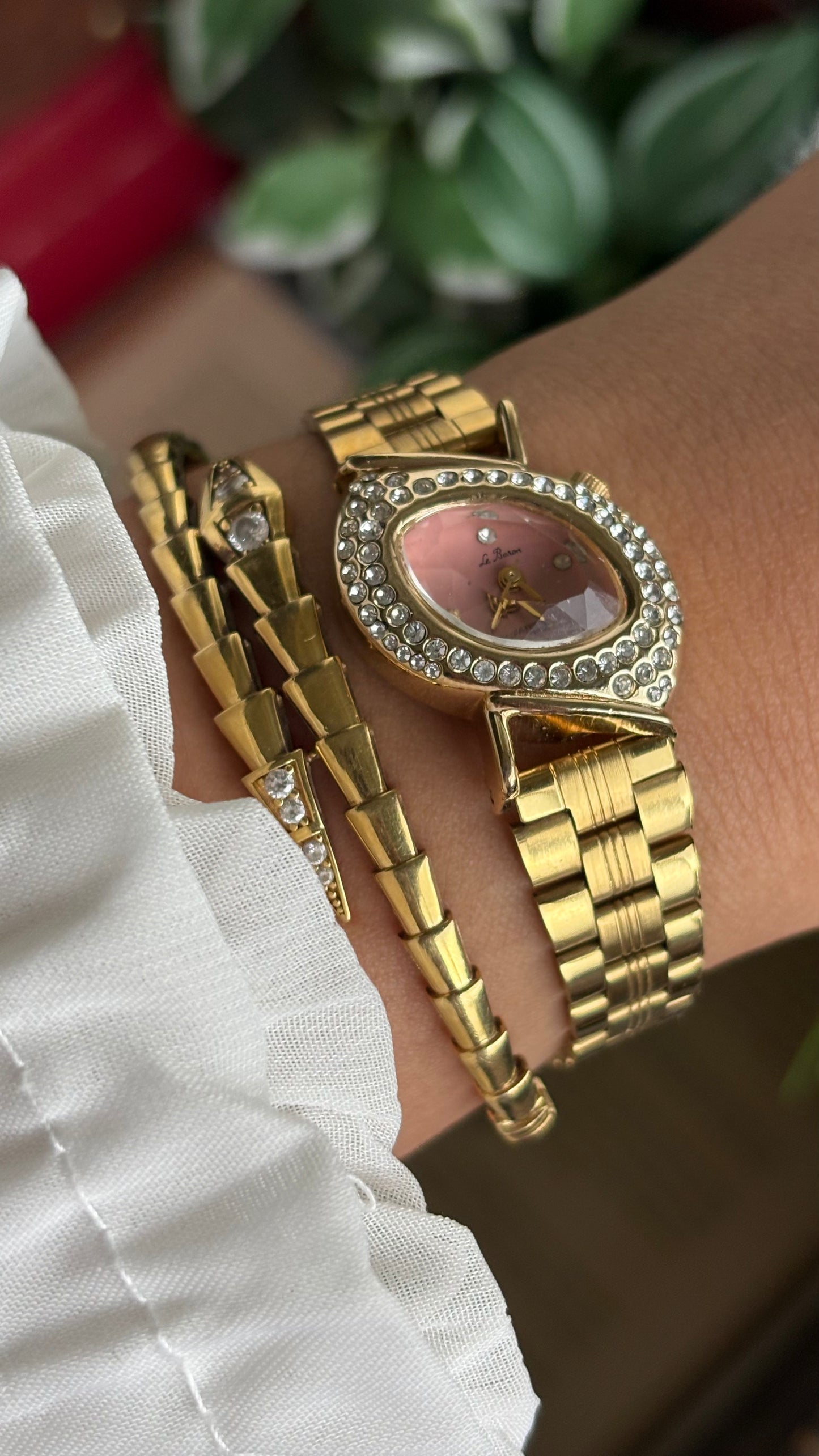 Vintage Le Baron Bejeweled Watch in Gold Tone Pink Dial Leaf Face Shape