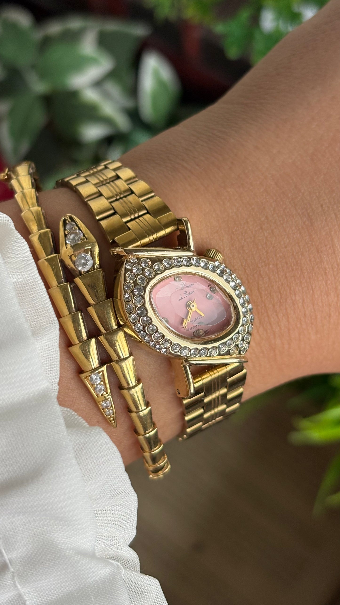 Vintage Le Baron Bejeweled Watch in Gold Tone Pink Dial Leaf Face Shape
