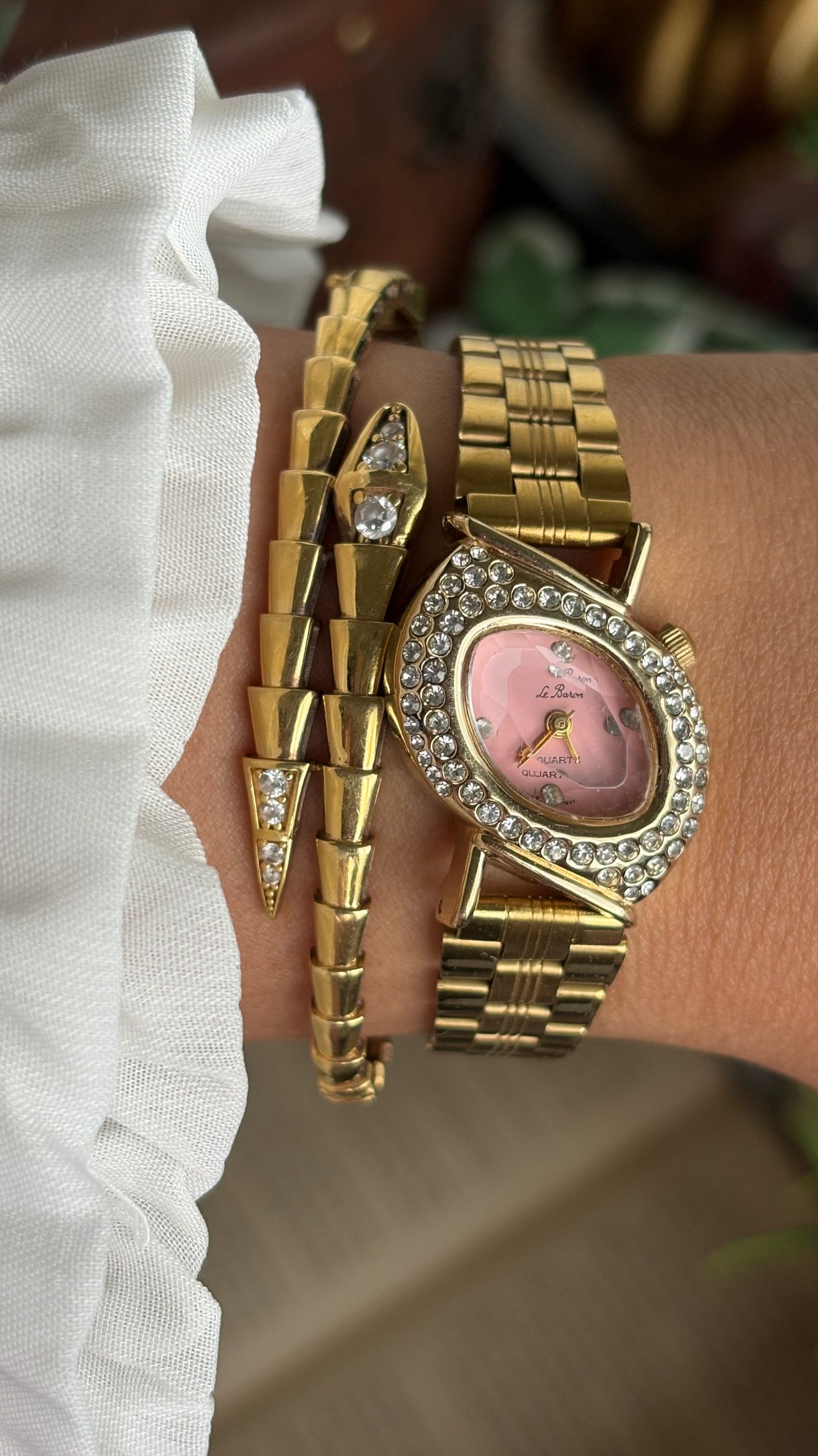 Vintage Le Baron Bejeweled Watch in Gold Tone Pink Dial Leaf Face Shape