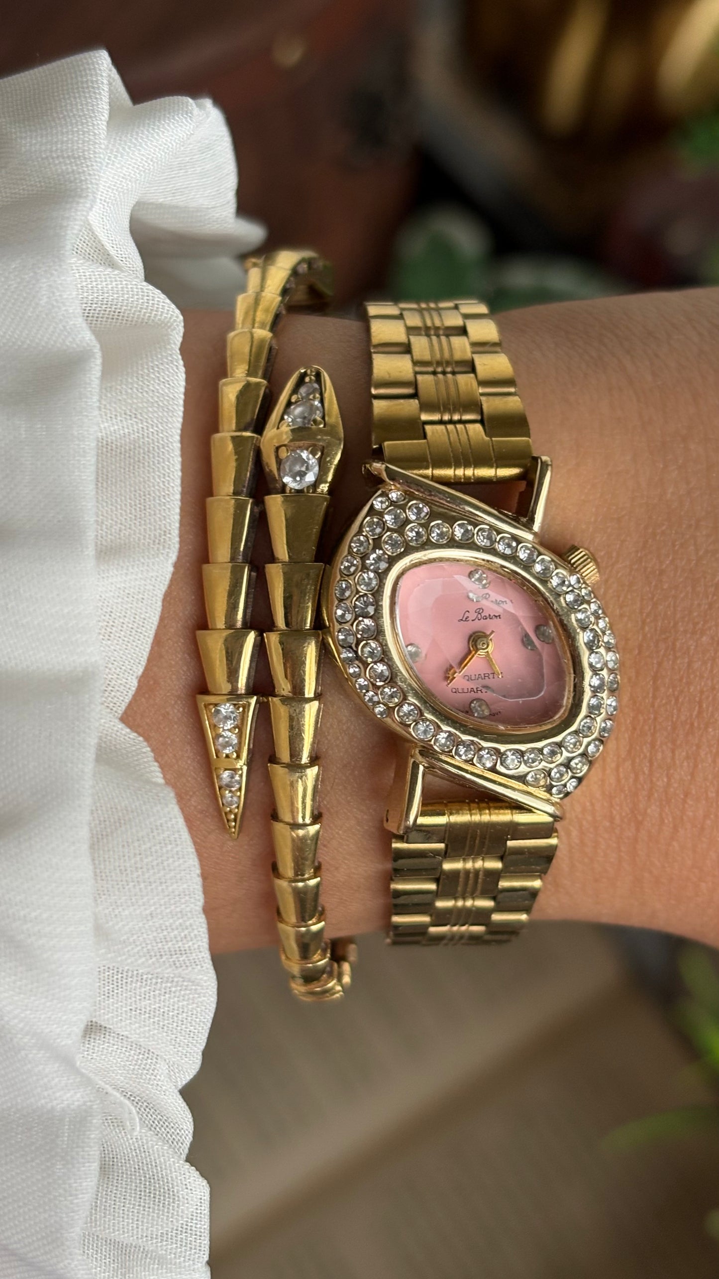Vintage Le Baron Bejeweled Watch in Gold Tone Pink Dial Leaf Face Shape