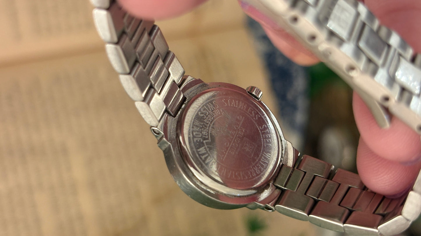 Rare Vintage Givenchy Paris Swiss Classic Watch with Date Window in Silver Tone Quartz
