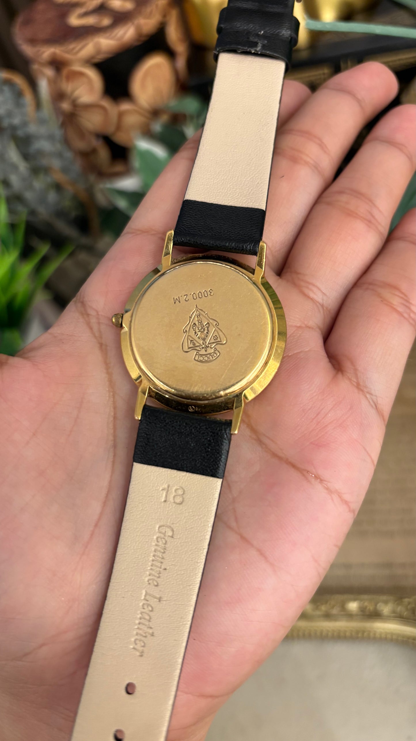Vintage Gucci Swiss 3000 M Engraved Roman Bezel Mens Watch in Gold Tone Black Leather Blackout Dial Quartz