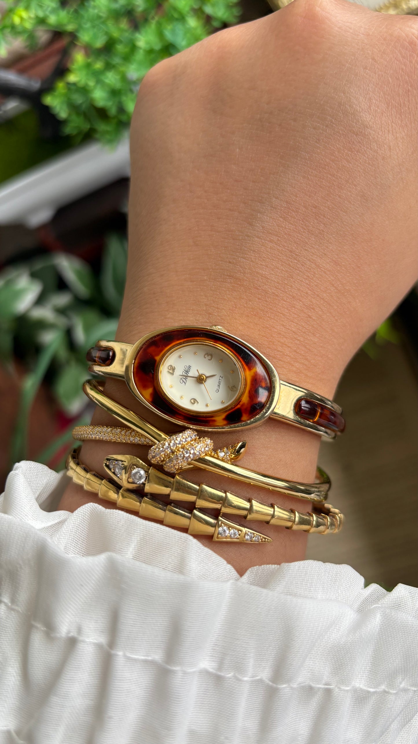 Vintage De Wan Tortoise Bangle Watch in Gold Tone Oval Face