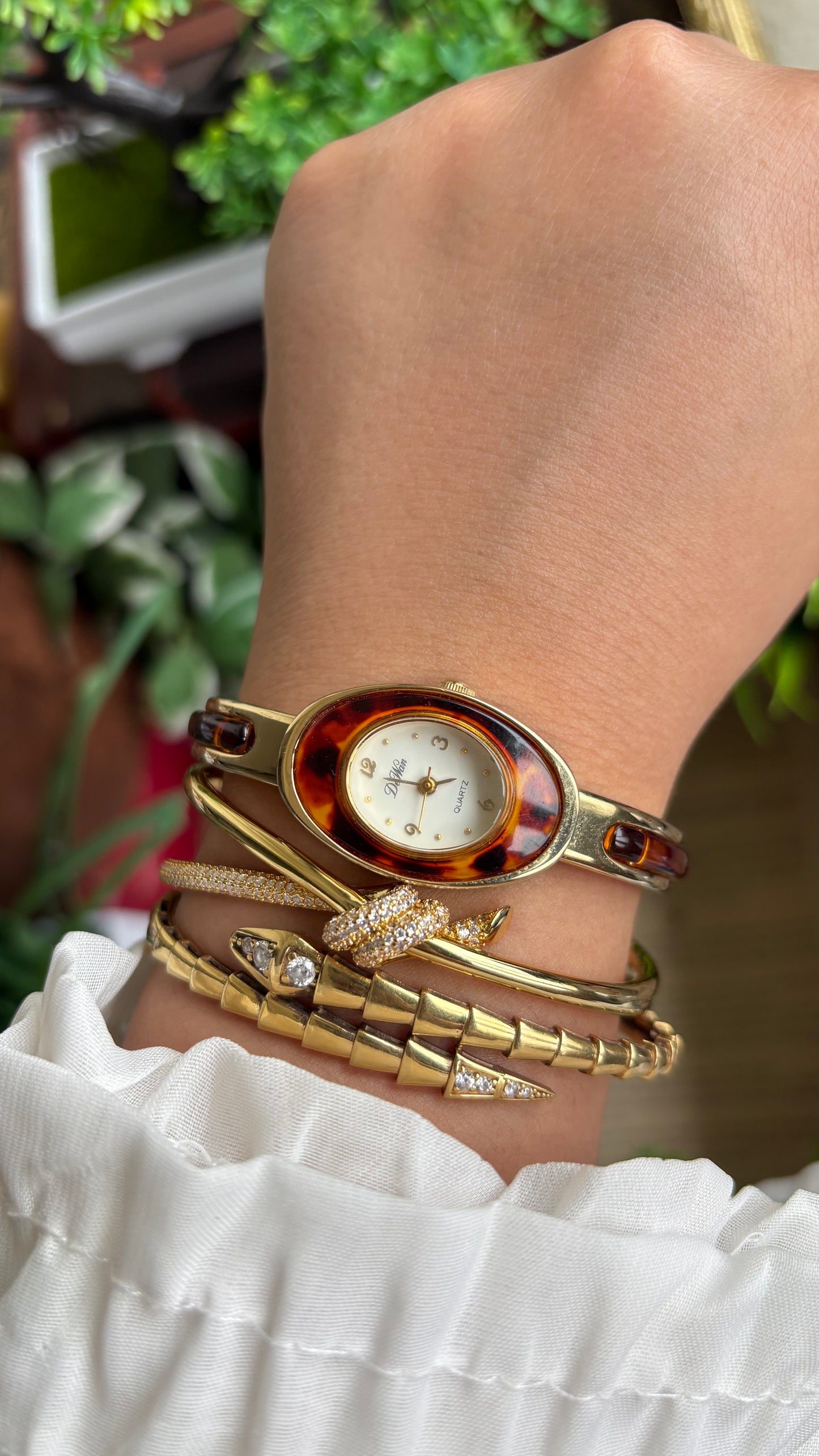 Vintage De Wan Tortoise Bangle Watch in Gold Tone Oval Face