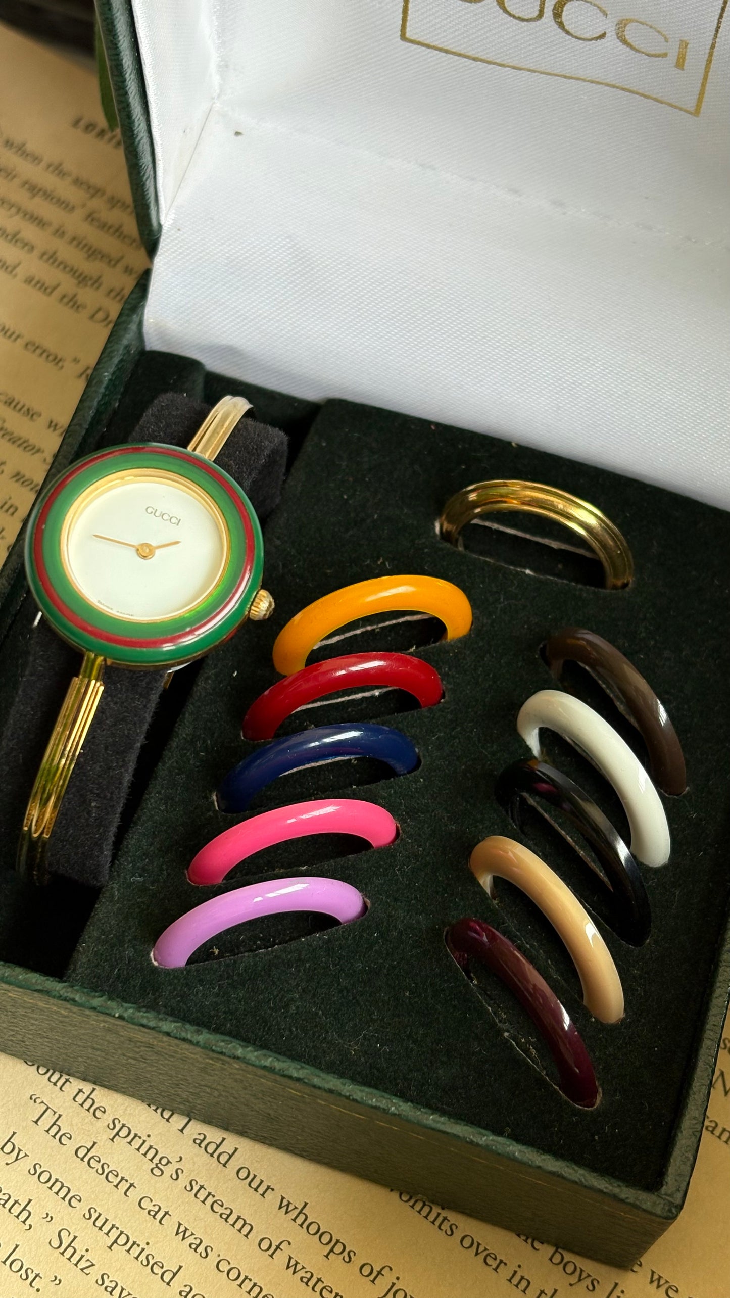 Vintage Gucci 1100L Interchangeable Bezel Set Bangle Watch in Gold Tone Comes With Rare VIP Velvet Box and Metal Gold Ring