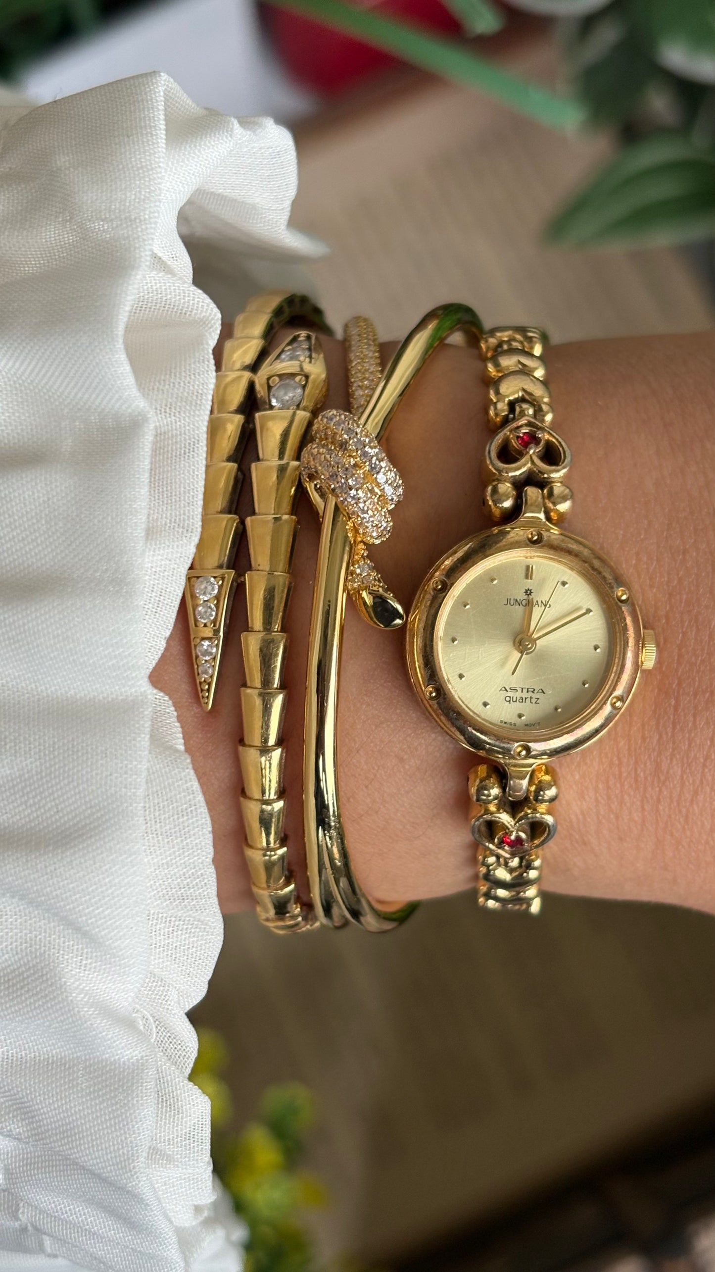 Vintage Junghans Astra Swiss Watch in Gold Tone Heart Straps with Garnet Stones