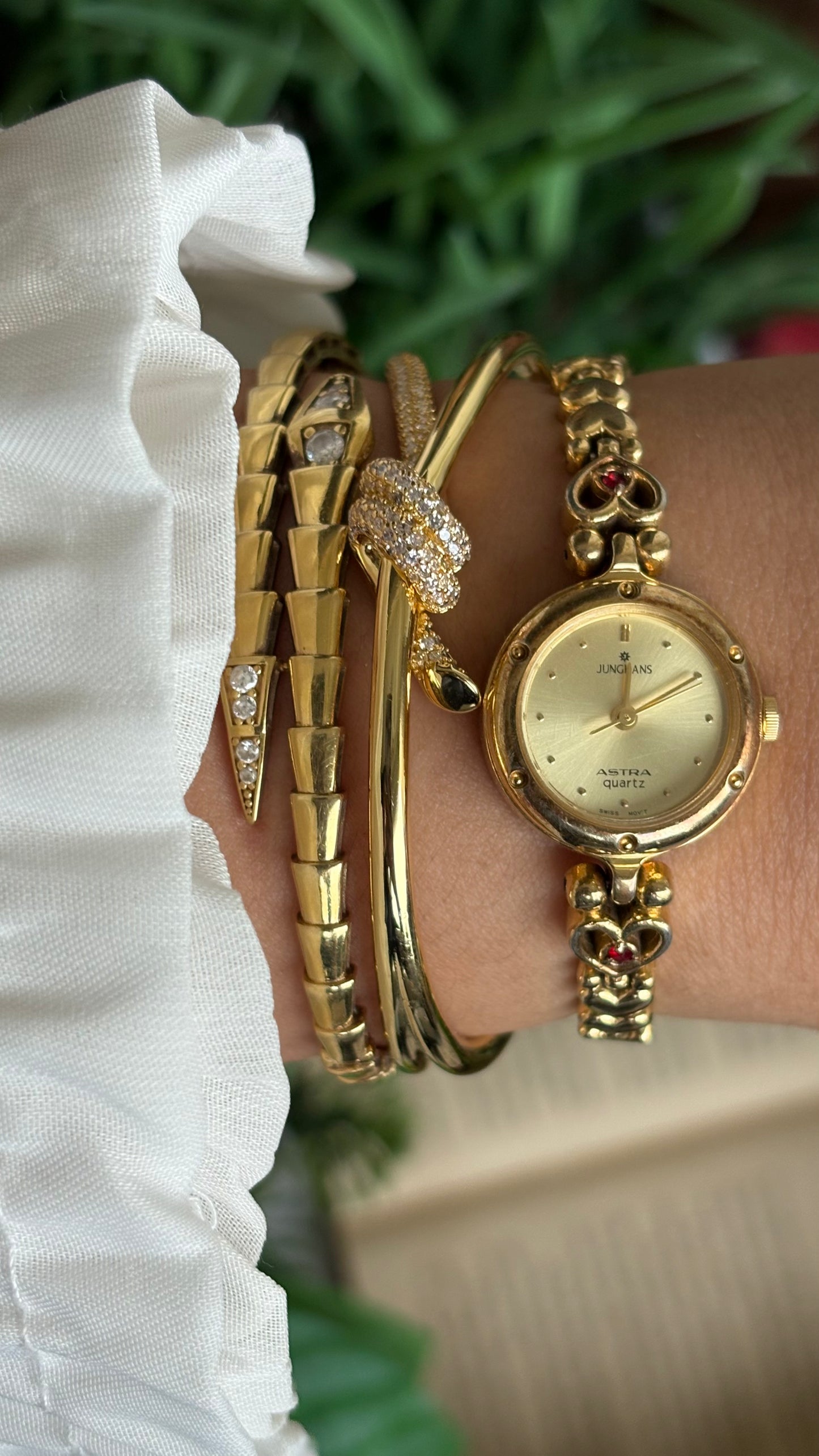 Vintage Junghans Astra Swiss Watch in Gold Tone Heart Straps with Garnet Stones