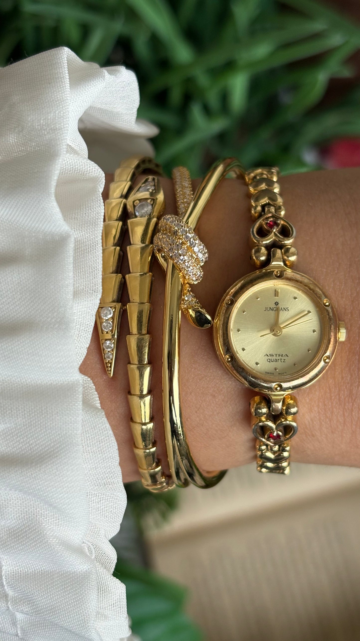 Vintage Junghans Astra Swiss Watch in Gold Tone Heart Straps with Garnet Stones