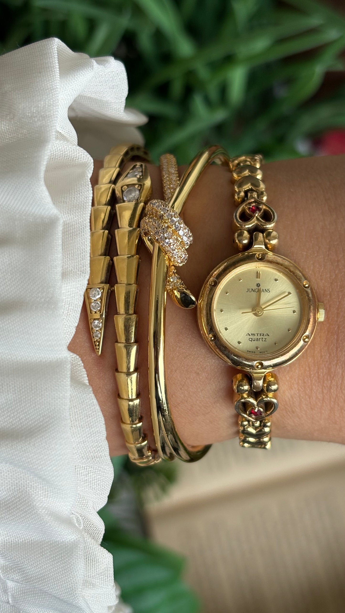 Vintage Junghans Astra Swiss Watch in Gold Tone Heart Straps with Garnet Stones