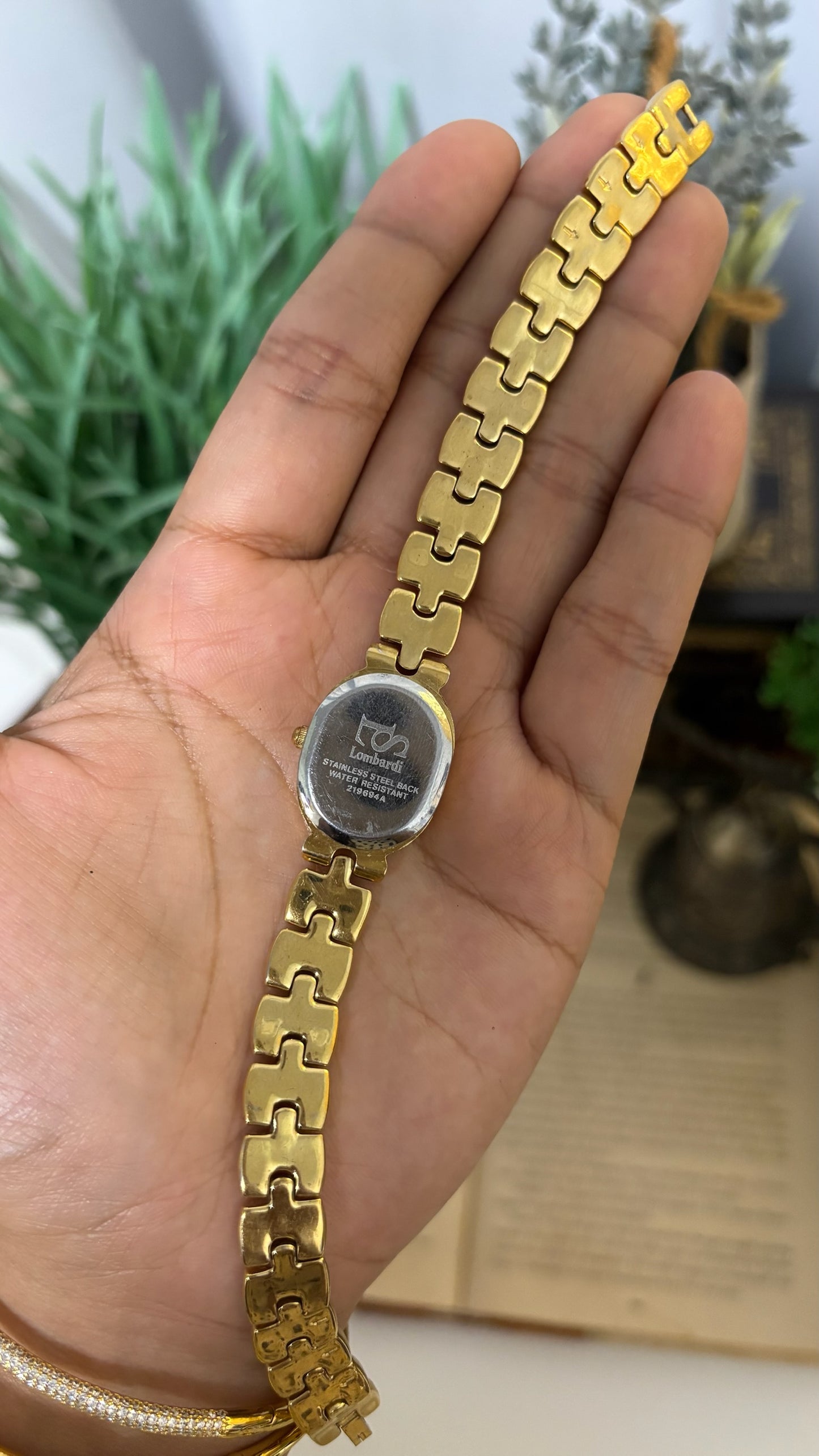 Vintage Lombardi Oval Mother of Pearl Dial Watch with Detailed H-Links in Gold Tone Quartz