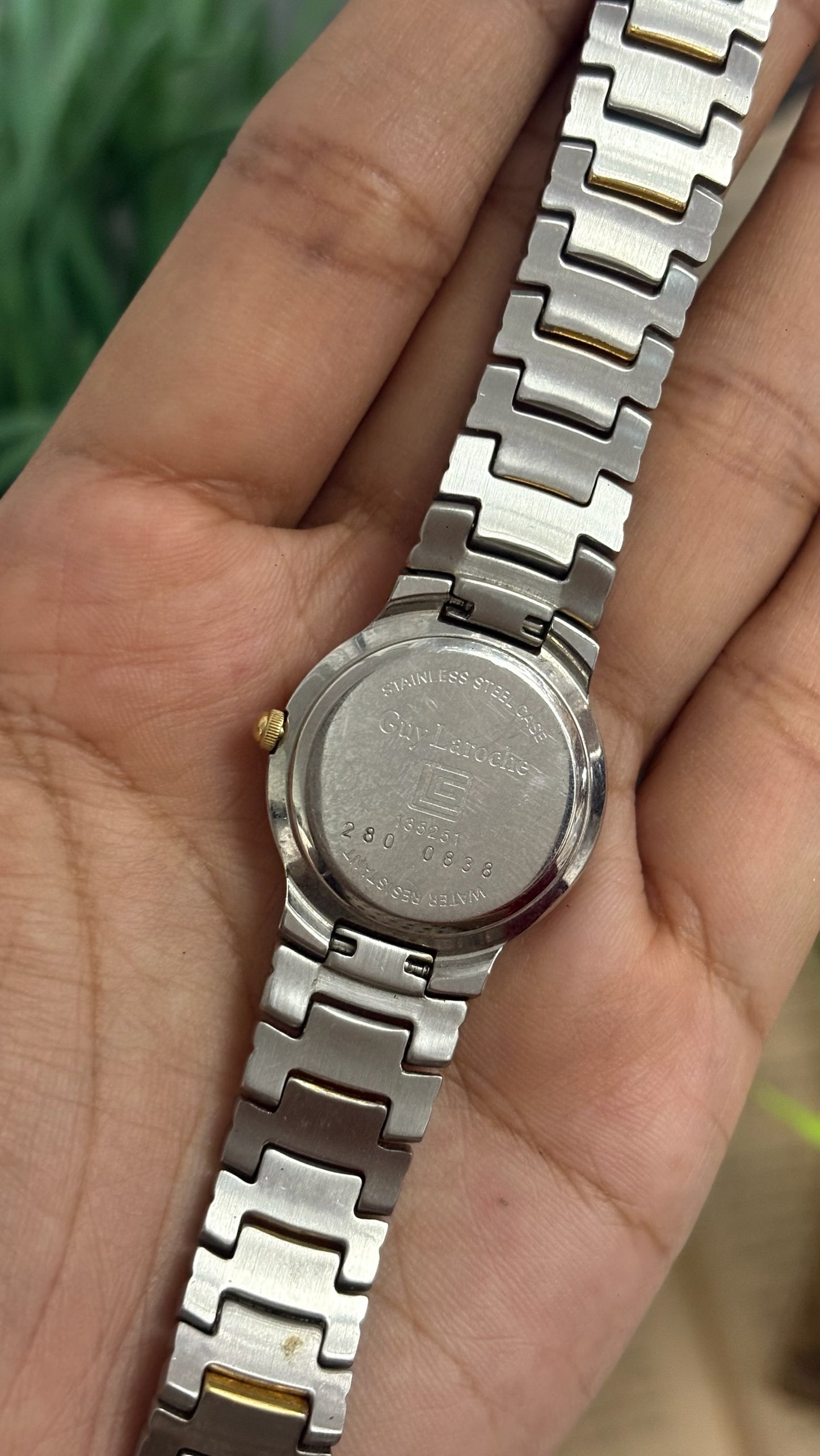 Vintage Guy Laroche Round Watch with Black and Gold Tone Bezel and Two-Tone Link Bracelet