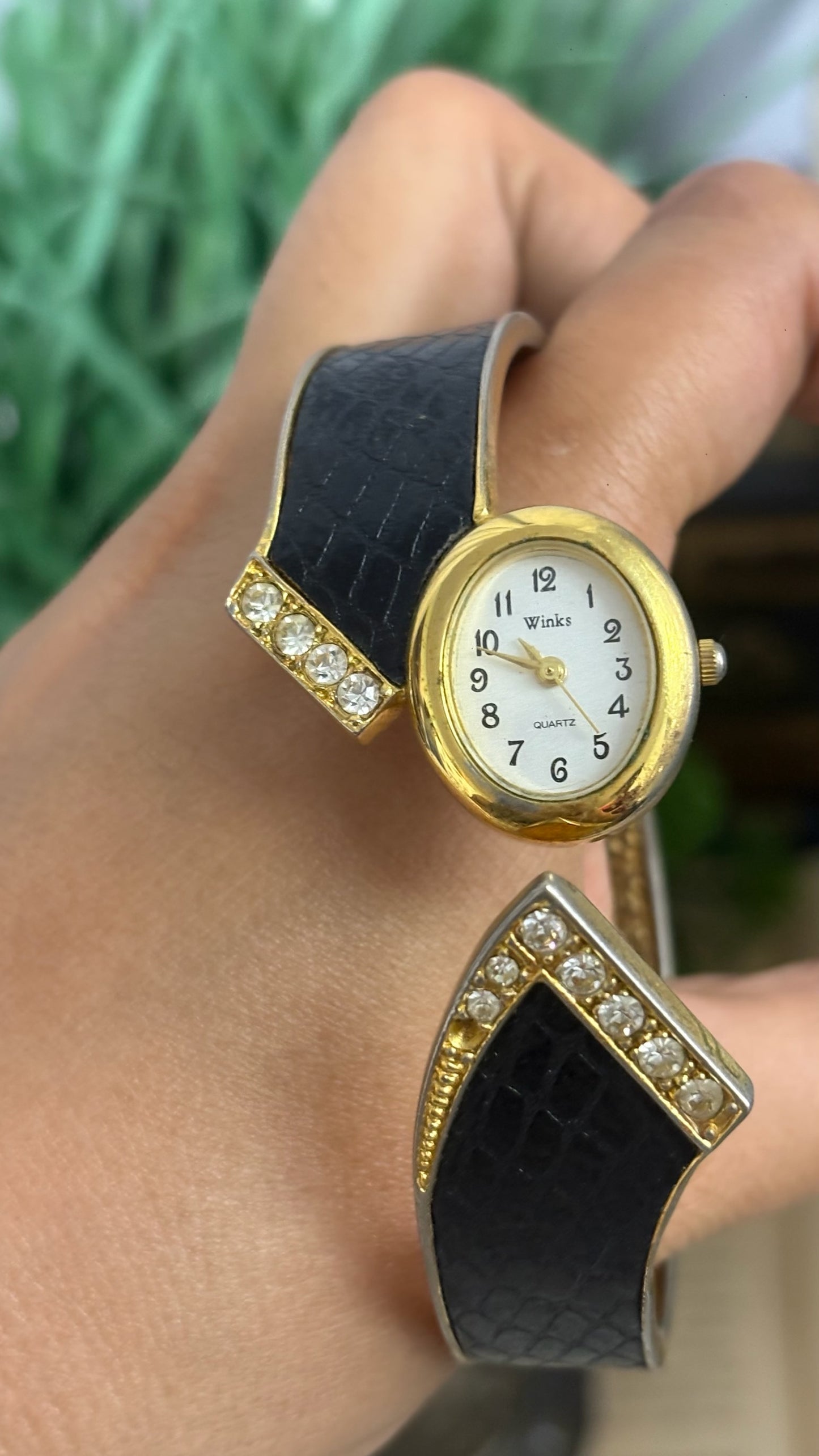 Vintage Winks Oval Watch with Crystal Accents and Black Faux-Leather Inlay Peekaboo Cuff Bracelet Quartz