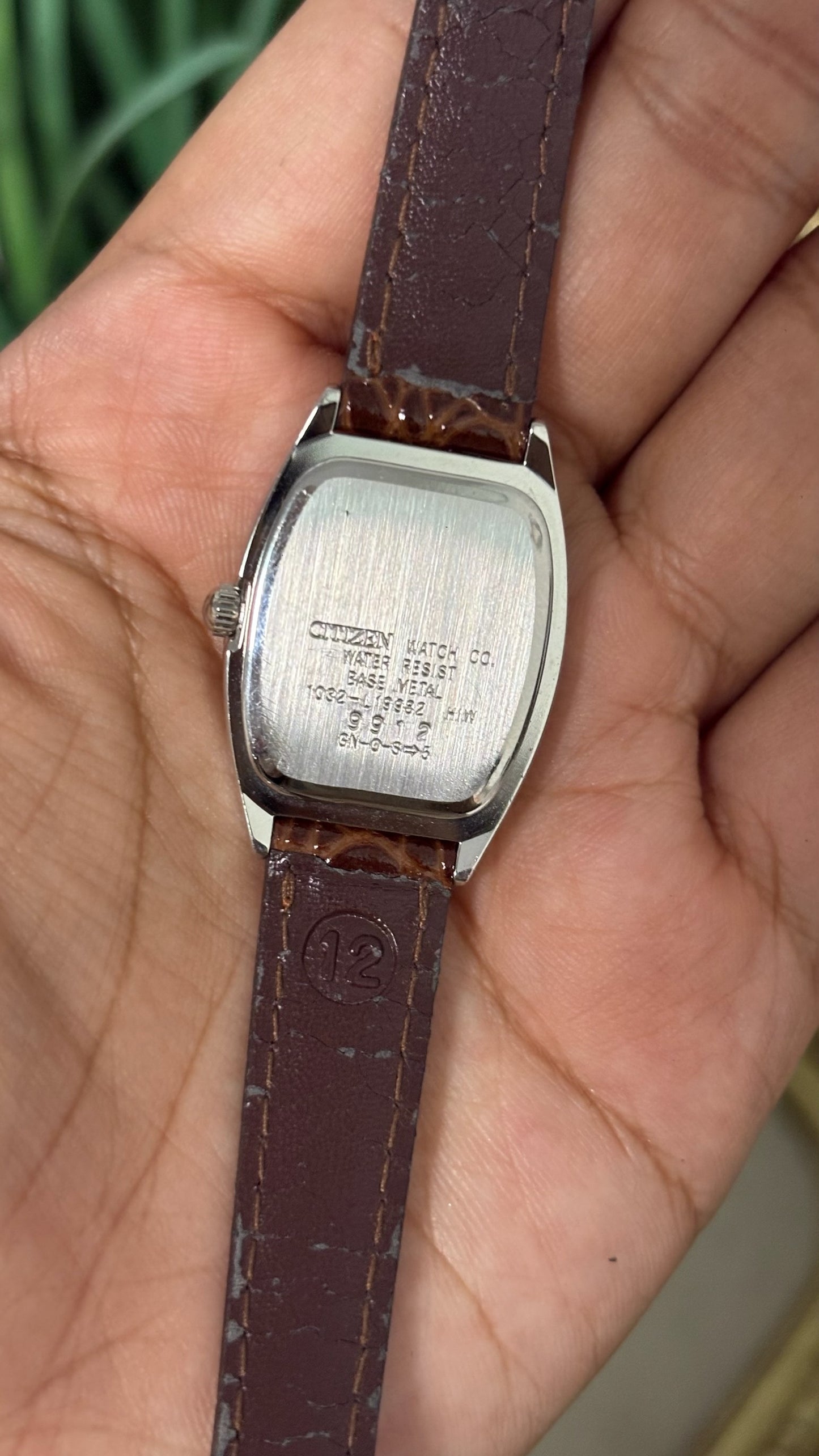 Vintage Renoma Paris Tonneau Watch with Silver Tone Dial Exploding Arabic Numerals Polished Silver Tone Case and Brown Croc Embossed Leather Strap Quartz