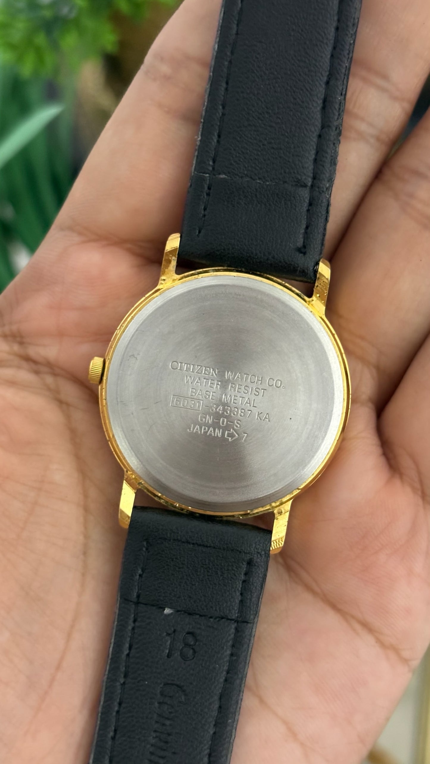 Vintage Citizen Hashimoto Country Mens Round Golf Watch with Champagne Dial Engraved Golfer Silhouette Polished Gold Tone Case and Smooth Black Leather Strap Quartz