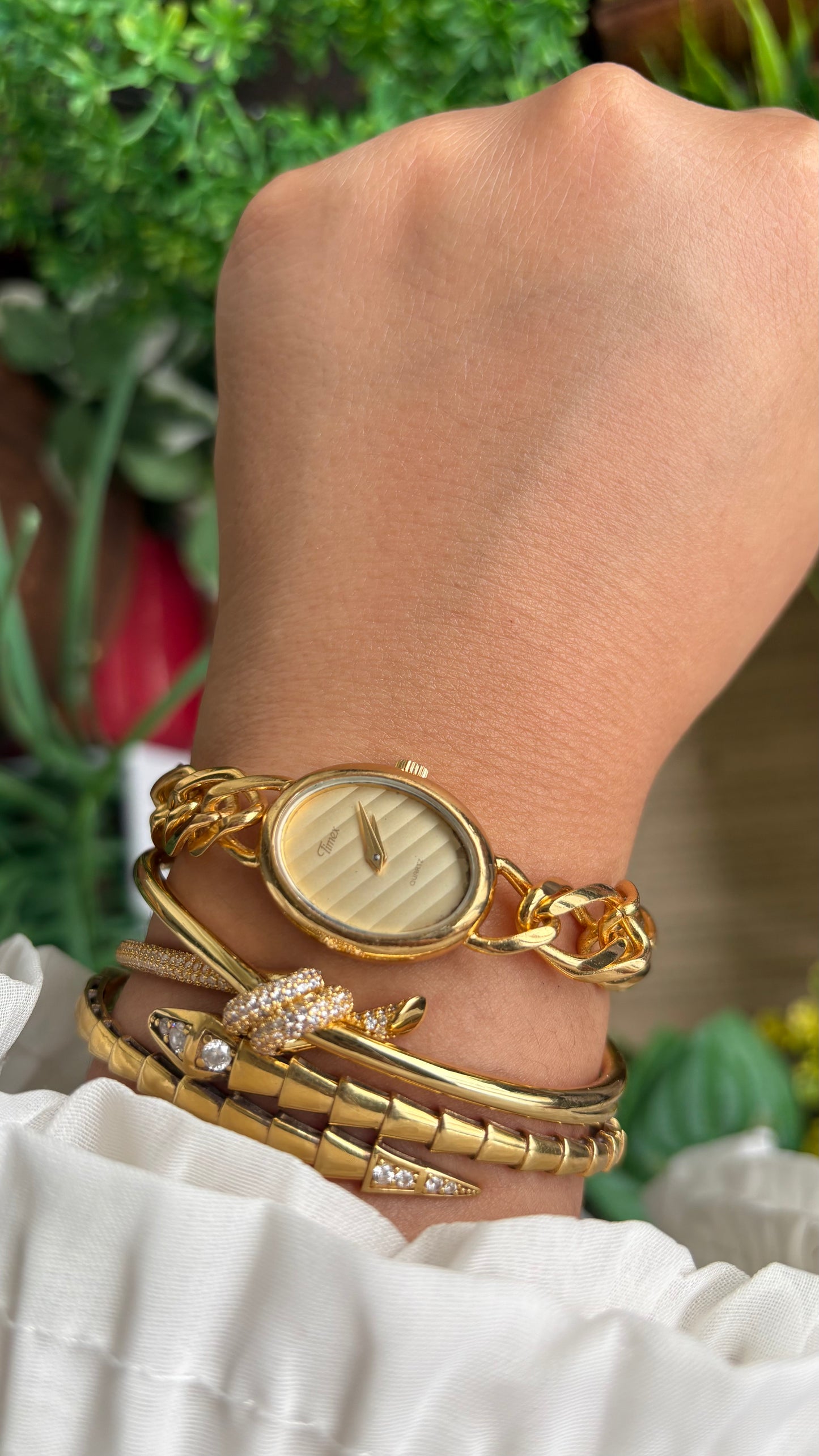 Vintage Timex Bracelet Watch in Gold Tone Oval Face Textured Dial