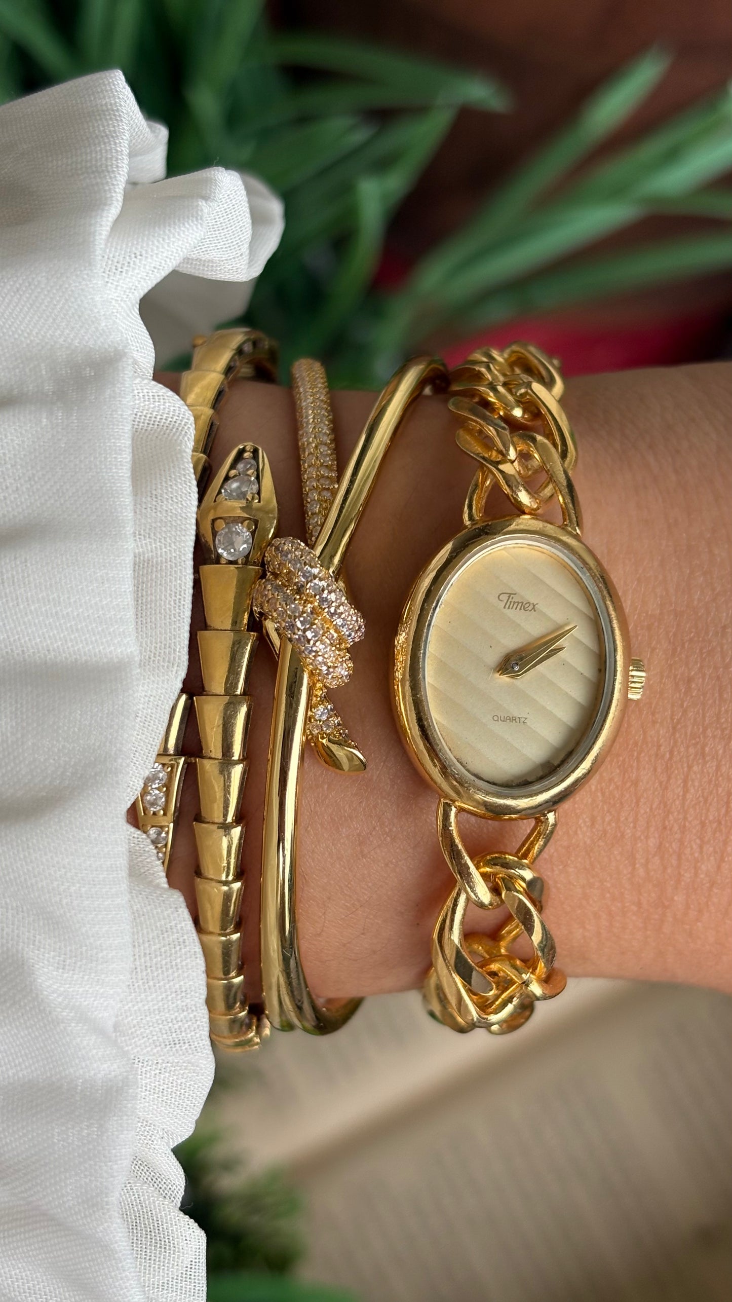 Vintage Timex Bracelet Watch in Gold Tone Oval Face Textured Dial