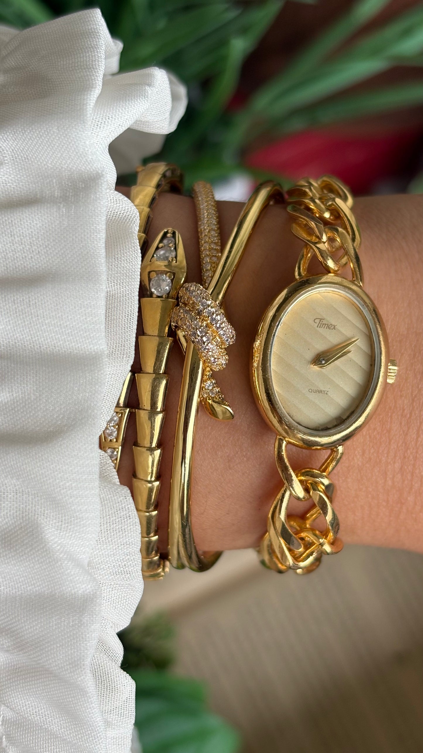 Vintage Timex Bracelet Watch in Gold Tone Oval Face Textured Dial