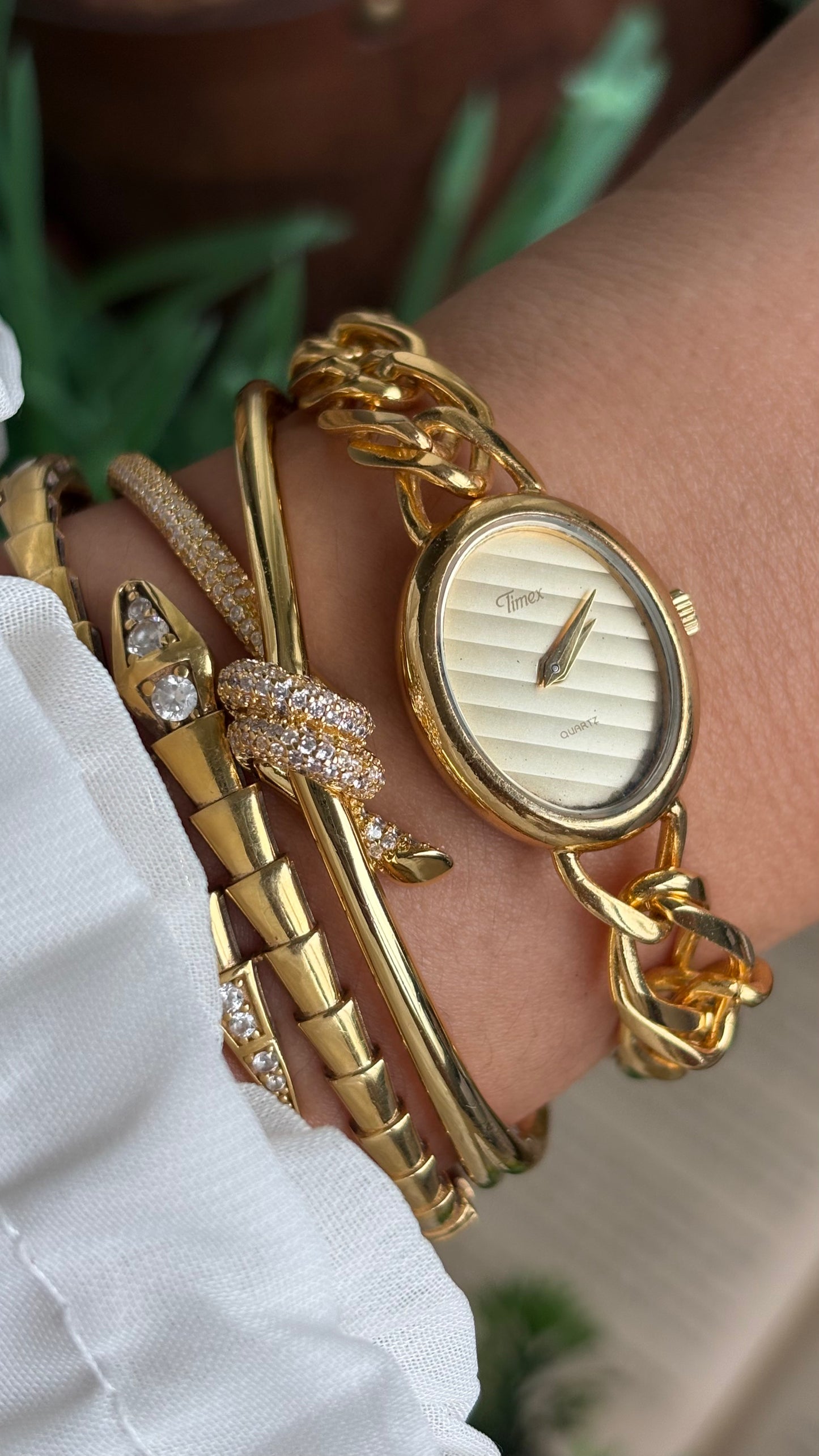 Vintage Timex Bracelet Watch in Gold Tone Oval Face Textured Dial