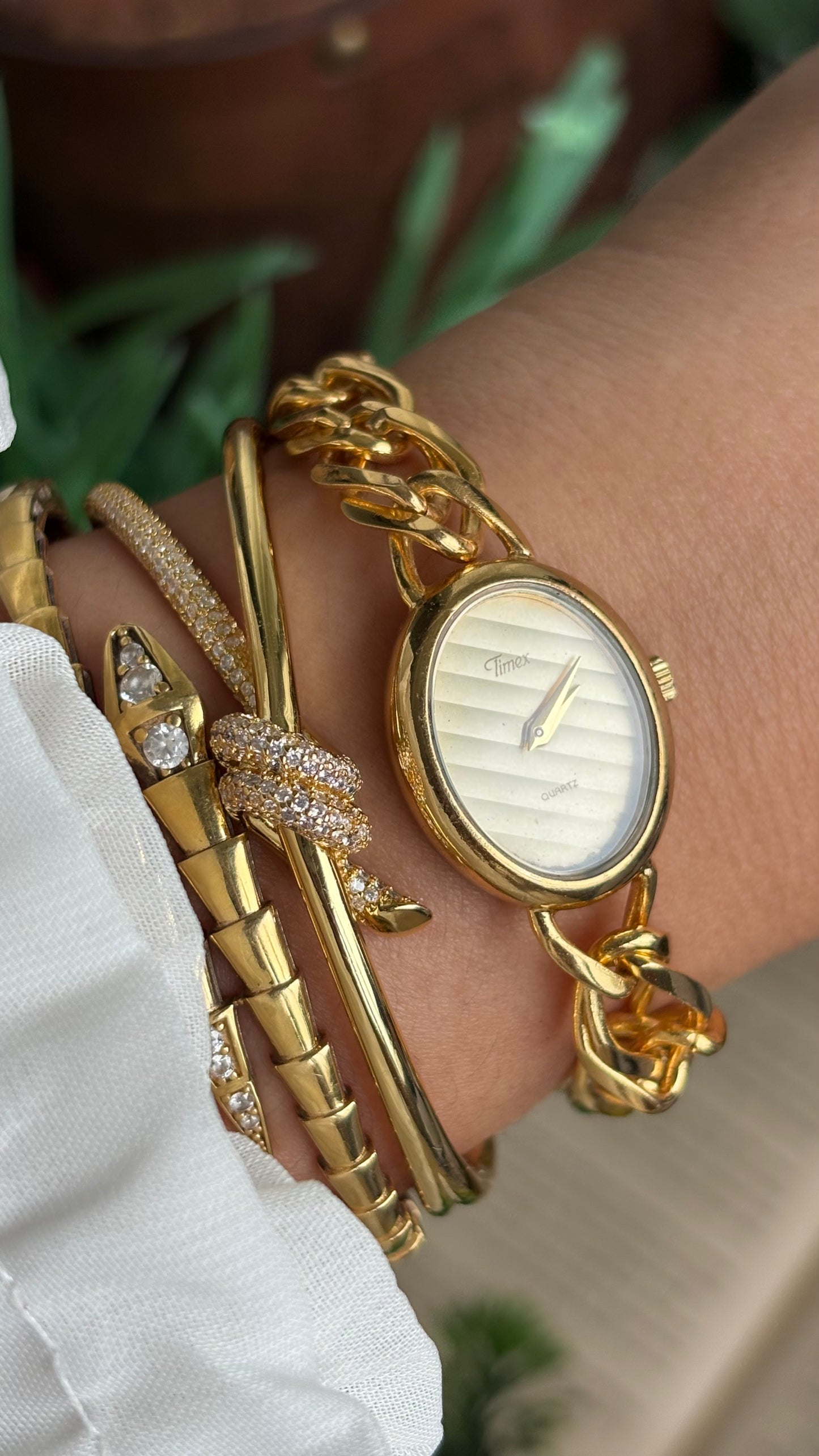 Vintage Timex Bracelet Watch in Gold Tone Oval Face Textured Dial