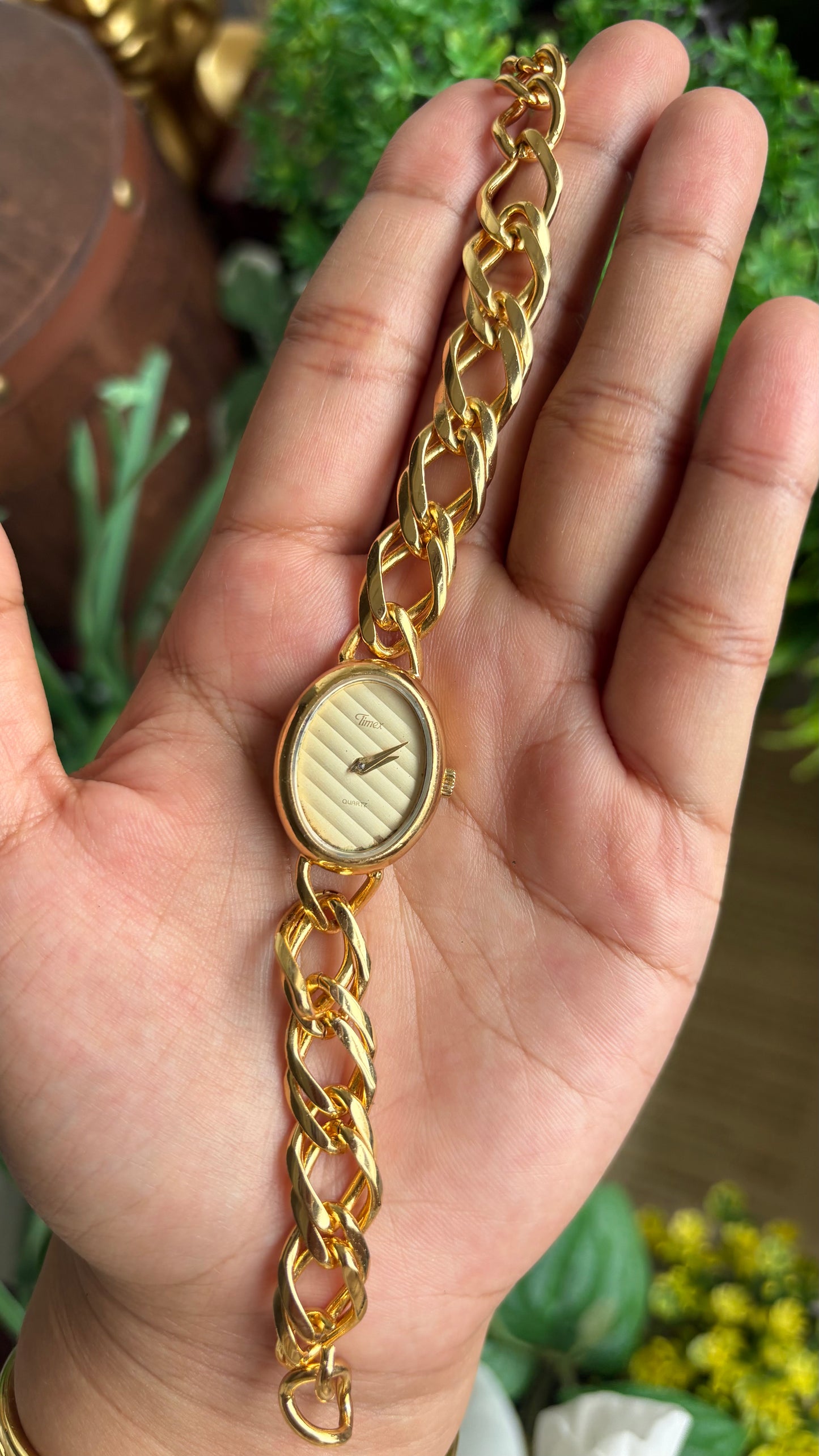 Vintage Timex Bracelet Watch in Gold Tone Oval Face Textured Dial