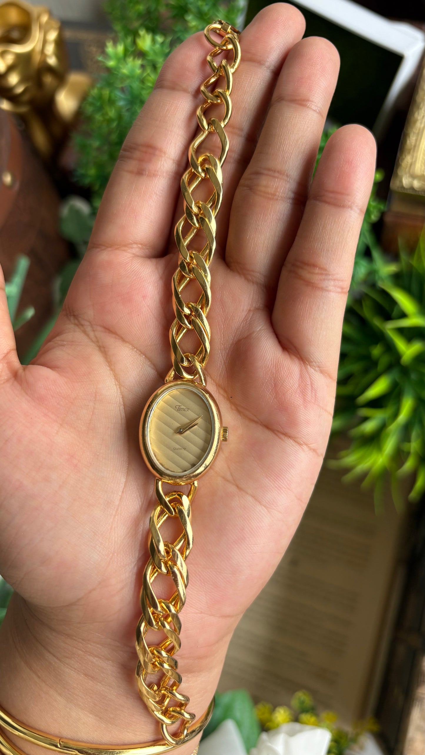 Vintage Timex Bracelet Watch in Gold Tone Oval Face Textured Dial