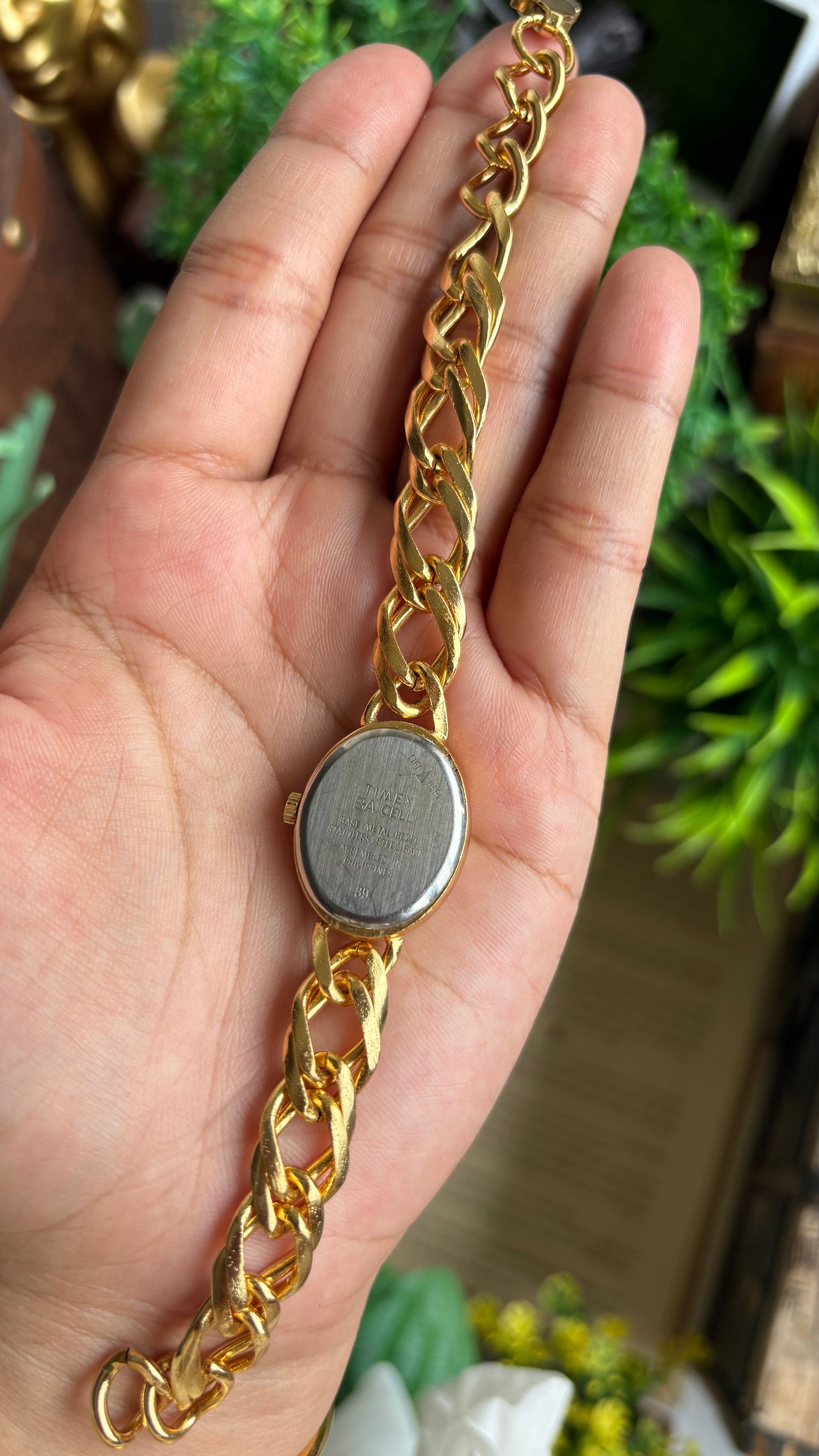 Vintage Timex Bracelet Watch in Gold Tone Oval Face Textured Dial