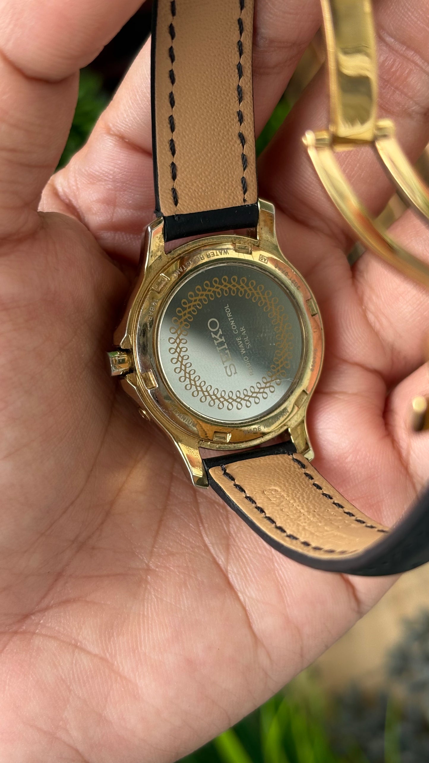 Extremely Rare Seiko Radio Wave Controlled Solar Power Watch in Gold Titanium Tone Black Leather Gray Mother of Pearl Dial Quartz #00601