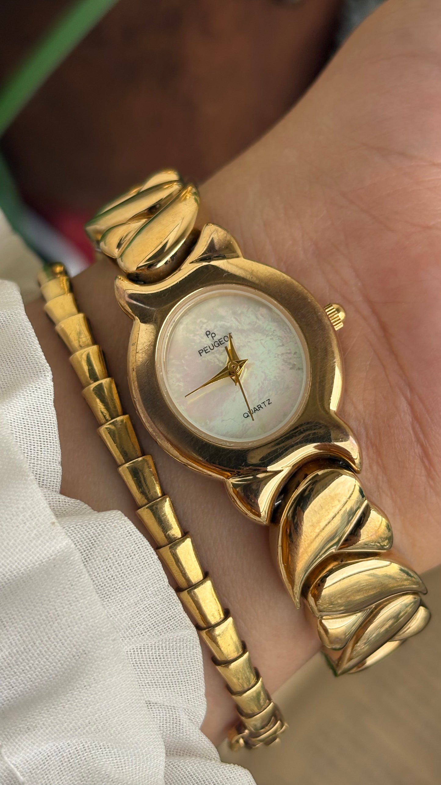 Vintage Peugeot Watch in Gold Tone Pearl Dial Heart Straps
