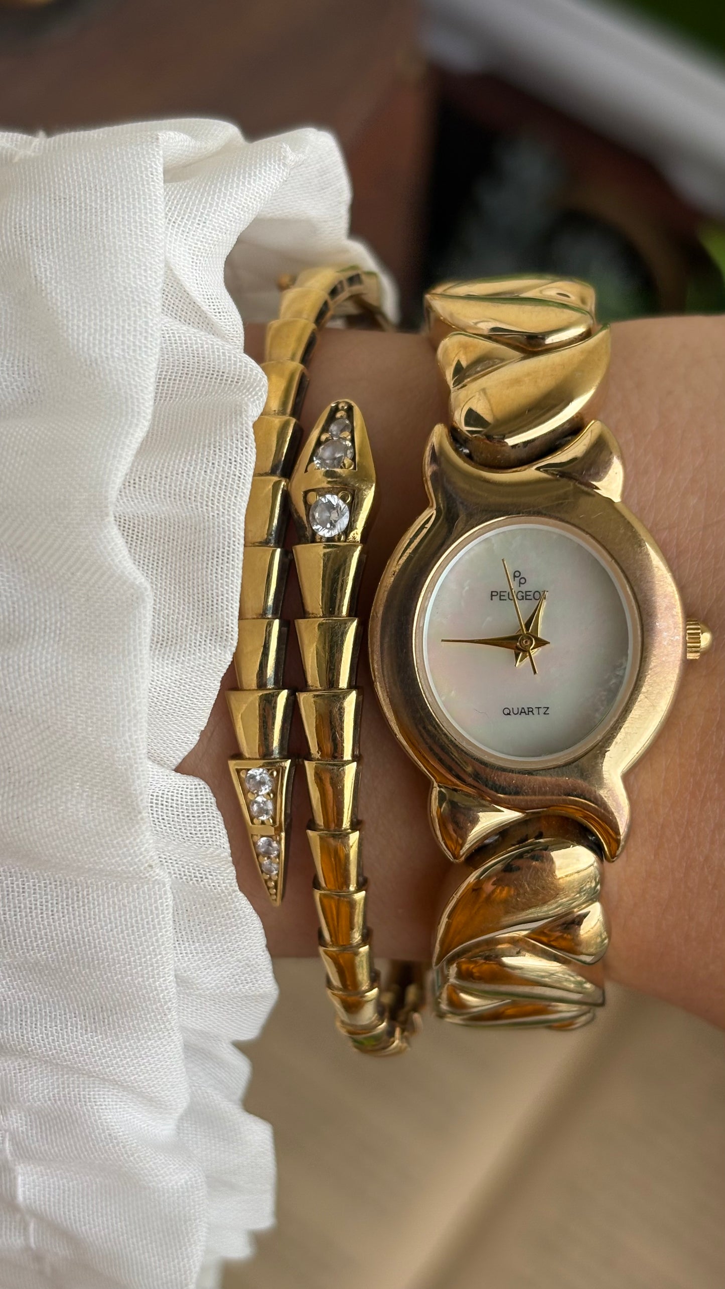 Vintage Peugeot Watch in Gold Tone Pearl Dial Heart Straps